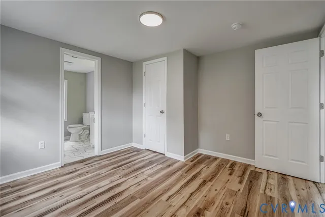a bathroom with a toilet and a sink