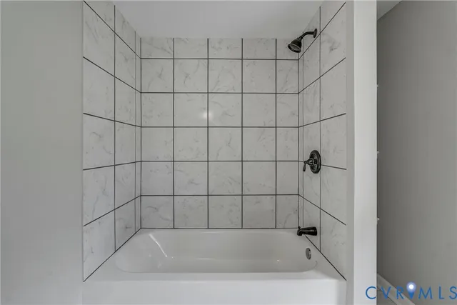 a view of a room with wooden floor and closet