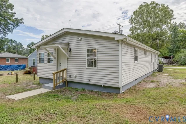 a view of a tree in a yard