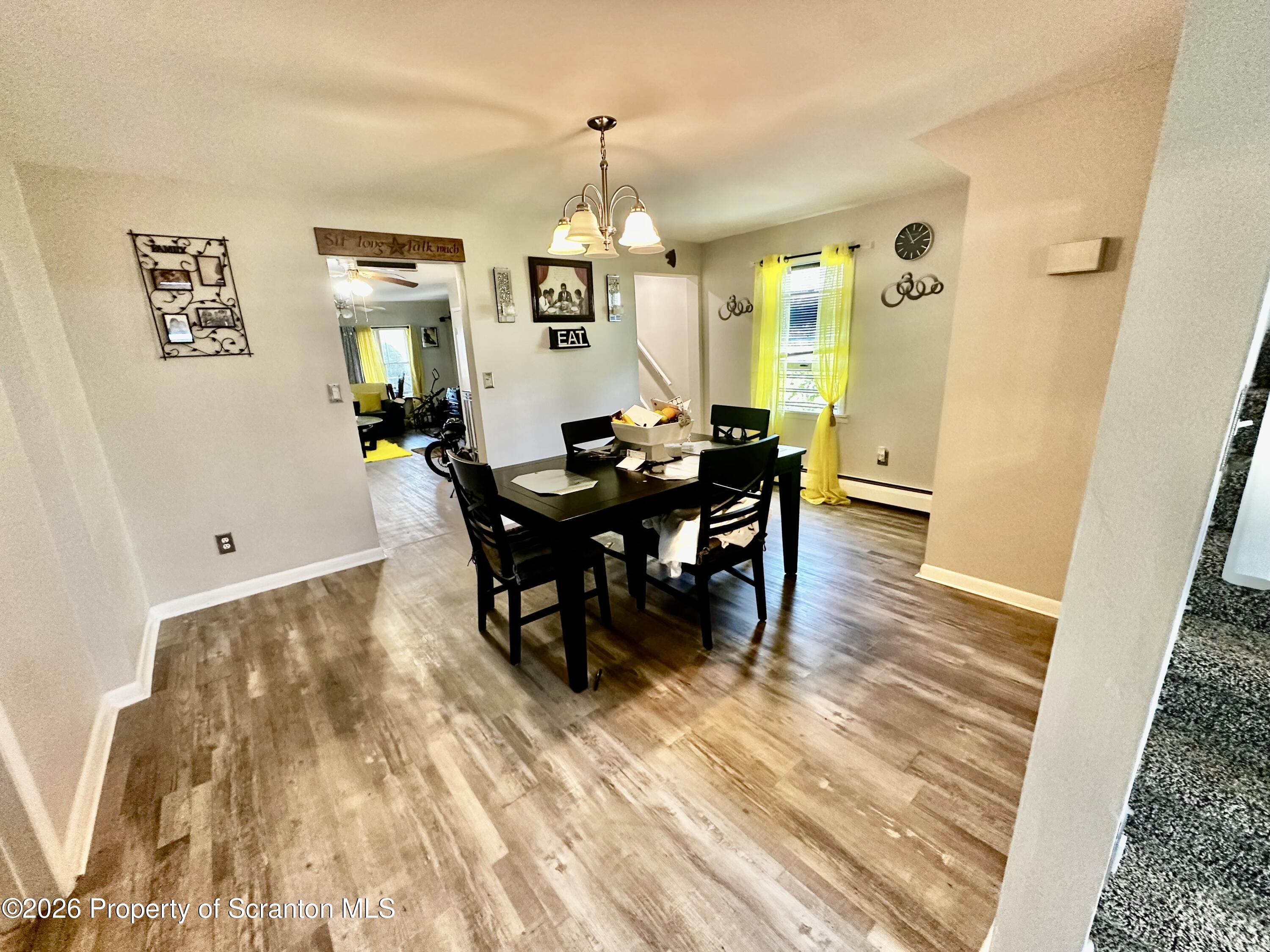 1727 Bulwer Street Scranton, PA 18504 - Photo 14 of 40 a view of a dining room with furniture and chandelier