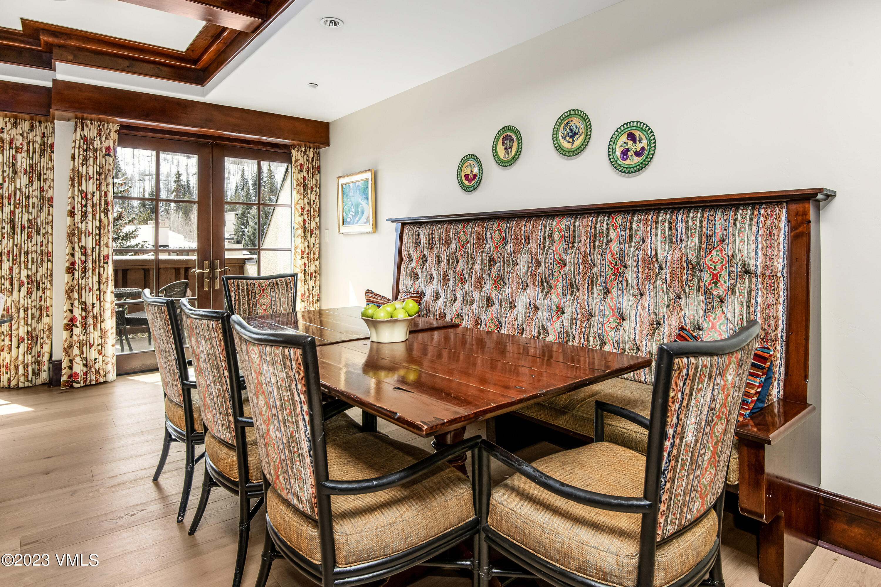 1 Willow Bridge Road, Unit 32F Vail, CO 81657 - Photo 12 of 41 a dining room with furniture and wooden floor