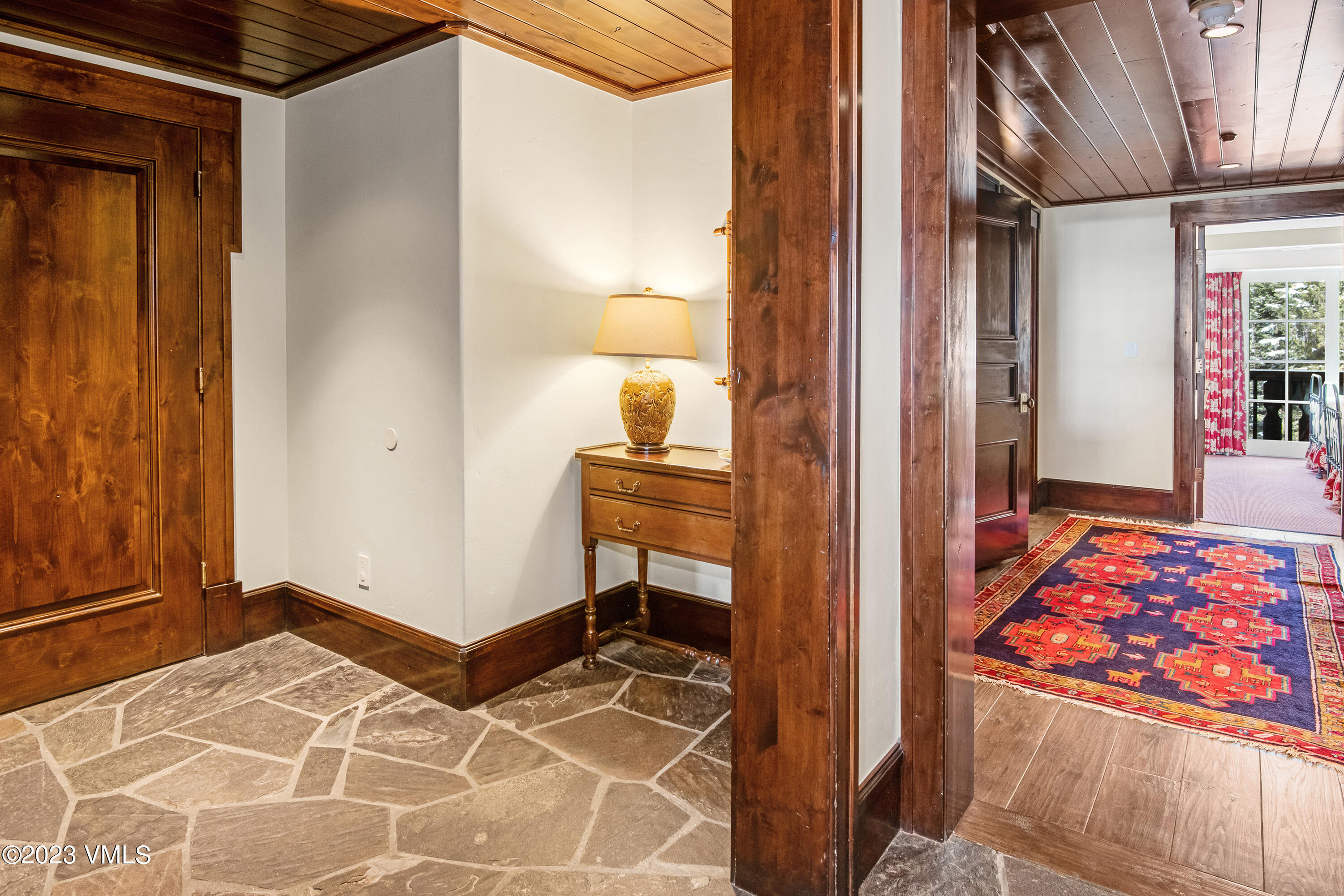 1 Willow Bridge Road, Unit 32F Vail, CO 81657 - Photo 14 of 41 a bedroom with a bed and a table in it