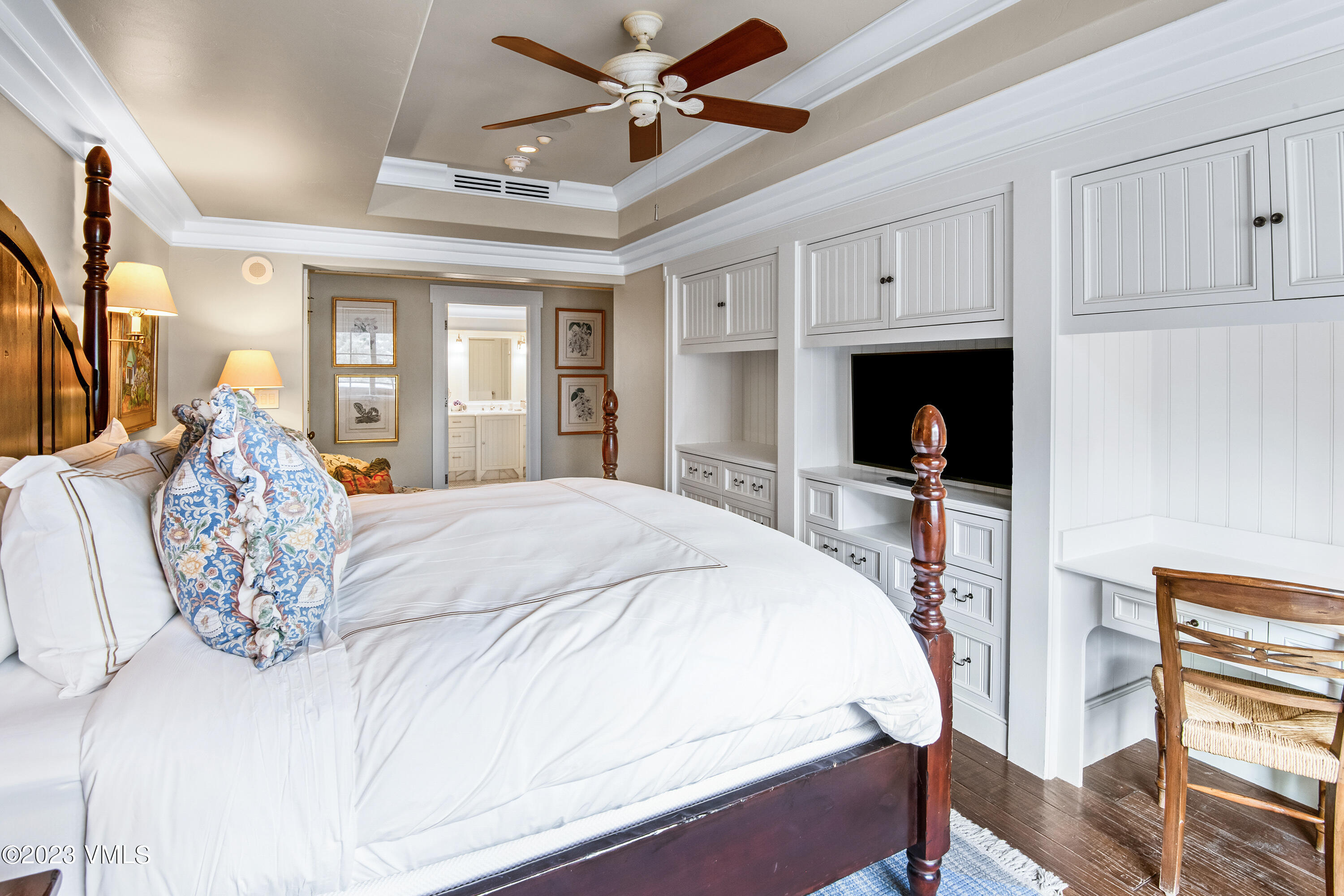 1 Willow Bridge Road, Unit 32F Vail, CO 81657 - Photo 16 of 41 a bed sitting in a bedroom and chandelier