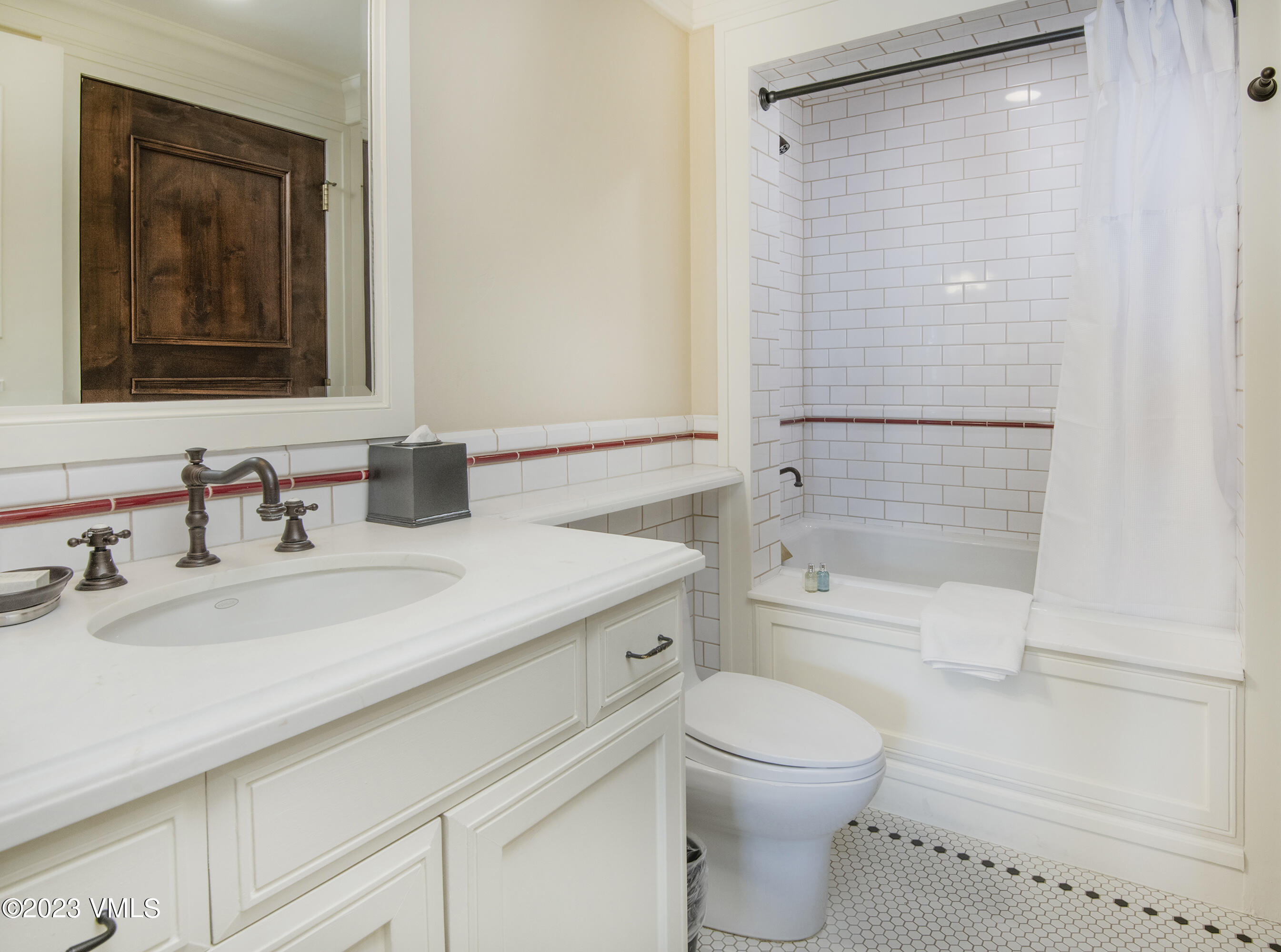 1 Willow Bridge Road, Unit 32F Vail, CO 81657 - Photo 25 of 41 a bathroom with a granite countertop sink a toilet and shower
