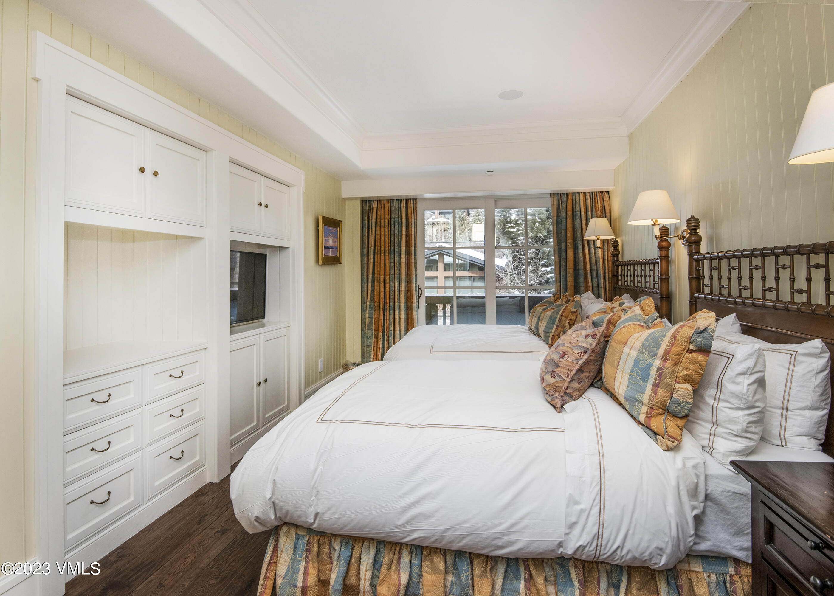 1 Willow Bridge Road, Unit 32F Vail, CO 81657 - Photo 28 of 41 a bed room with a bed and a window