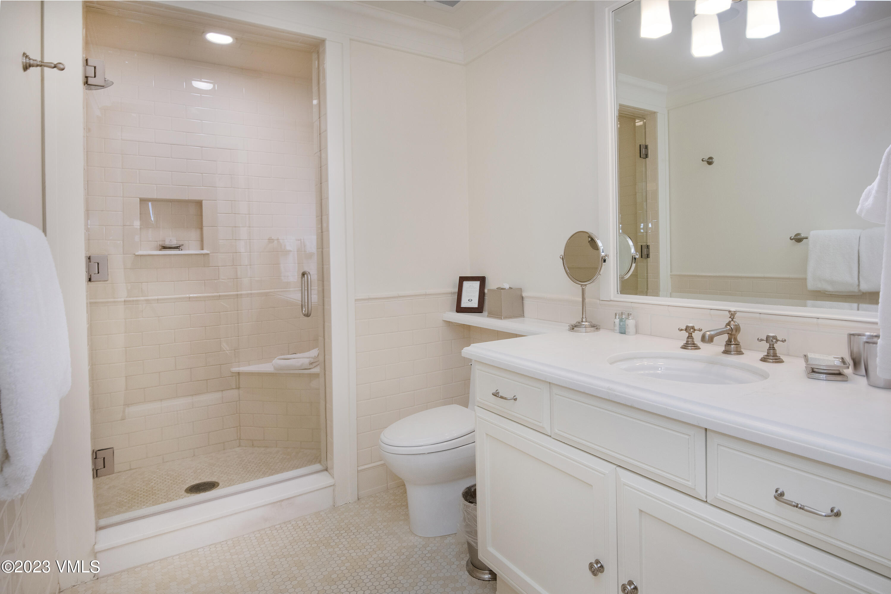 1 Willow Bridge Road, Unit 32F Vail, CO 81657 - Photo 30 of 41 a bathroom with a granite countertop sink a toilet and shower