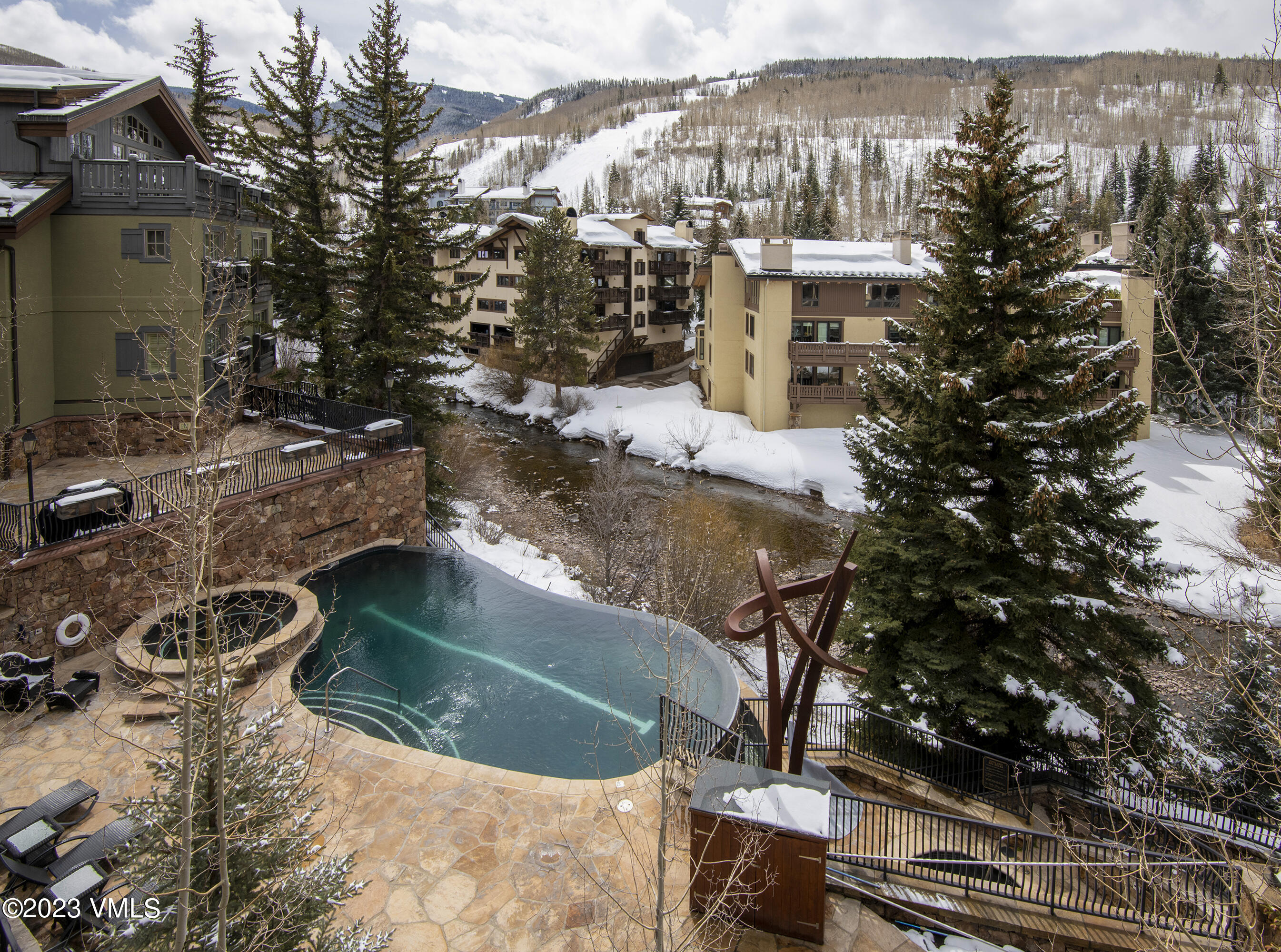1 Willow Bridge Road, Unit 32F Vail, CO 81657 - Photo 37 of 41 a view of a house with a yard