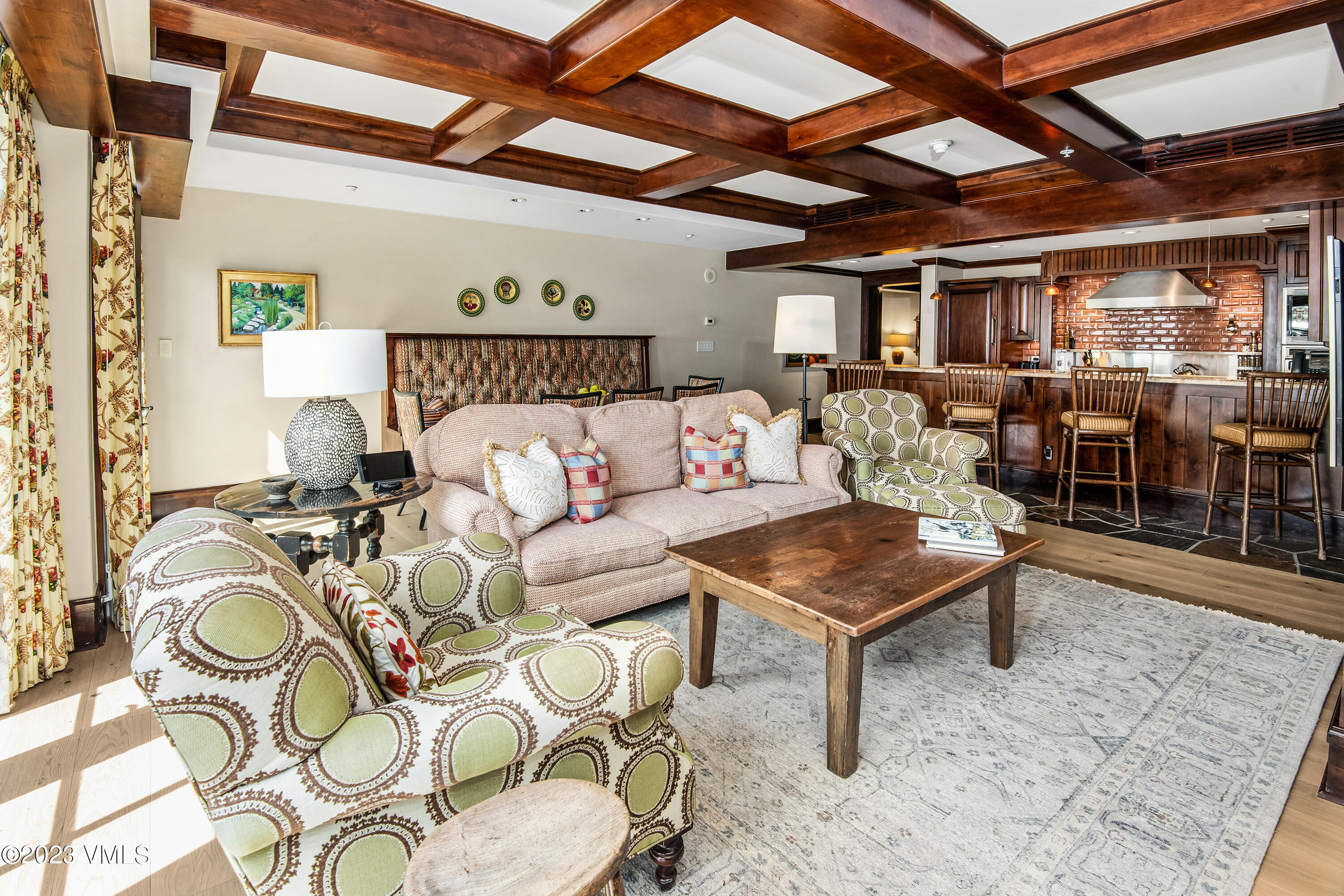 1 Willow Bridge Road, Unit 32F Vail, CO 81657 - Photo 5 of 41 a living room with furniture and a table