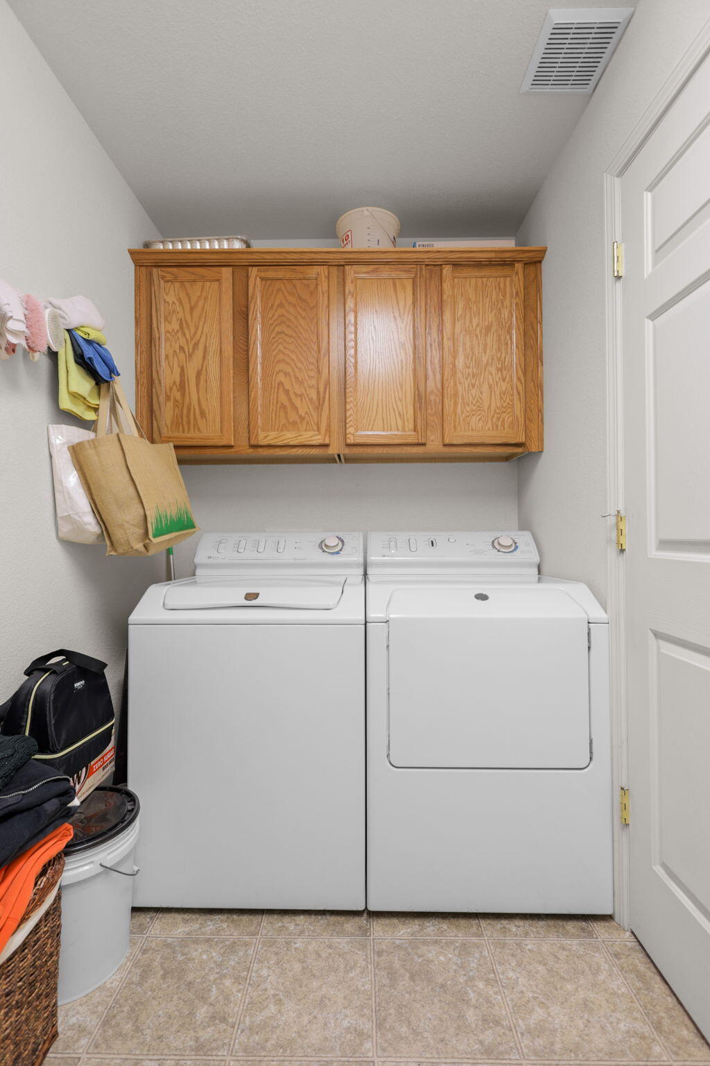 732 Stonebriar Trail Redding, CA 96003 - Photo 15 of 18 a utility room with dryer and washer