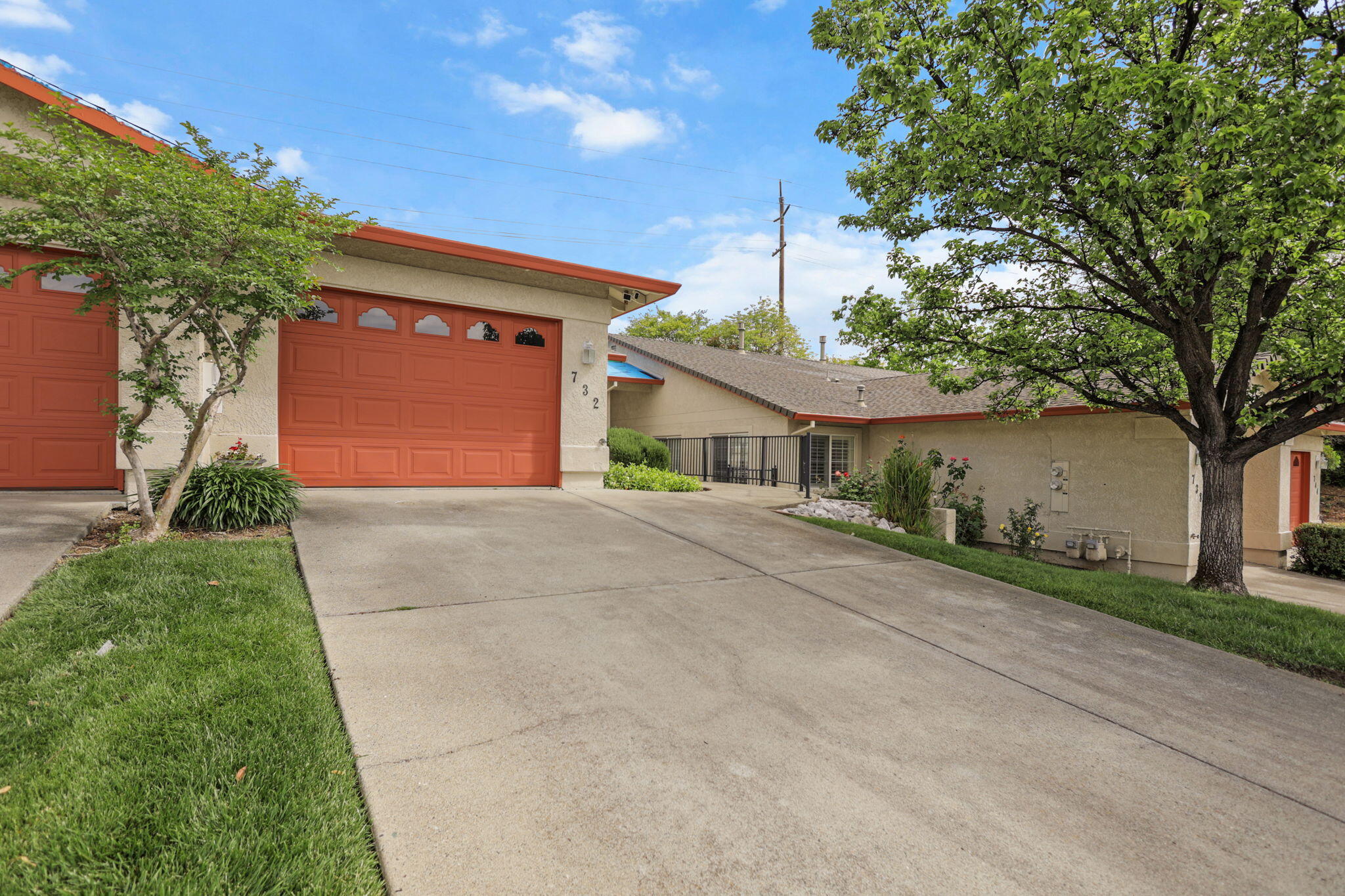 732 Stonebriar Trail Redding, CA 96003 - Photo 18 of 18 a front view of a house with a yard and garage