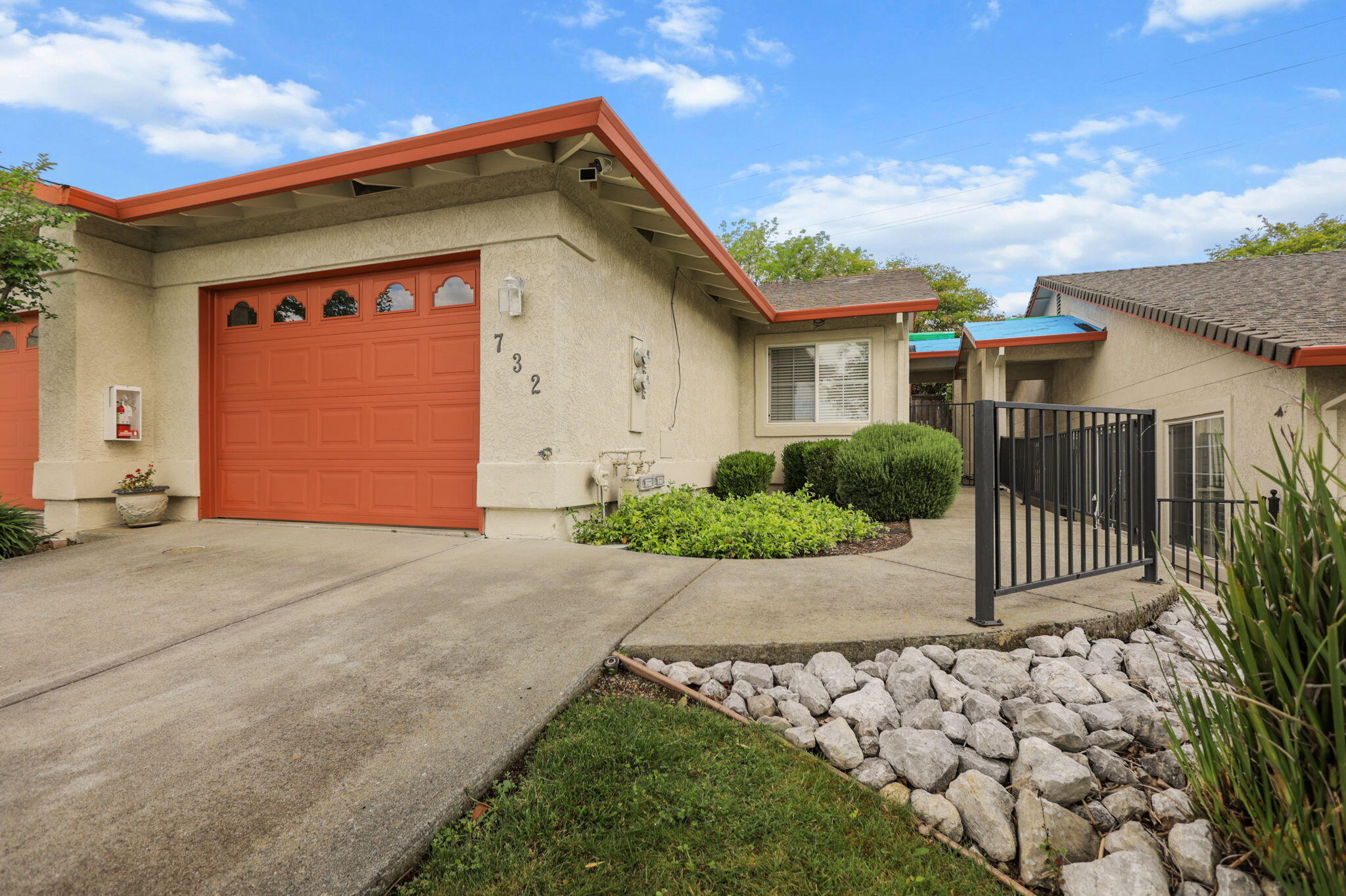 732 Stonebriar Trail Redding, CA 96003 - Photo 2 of 18 a front view of a house with a yard