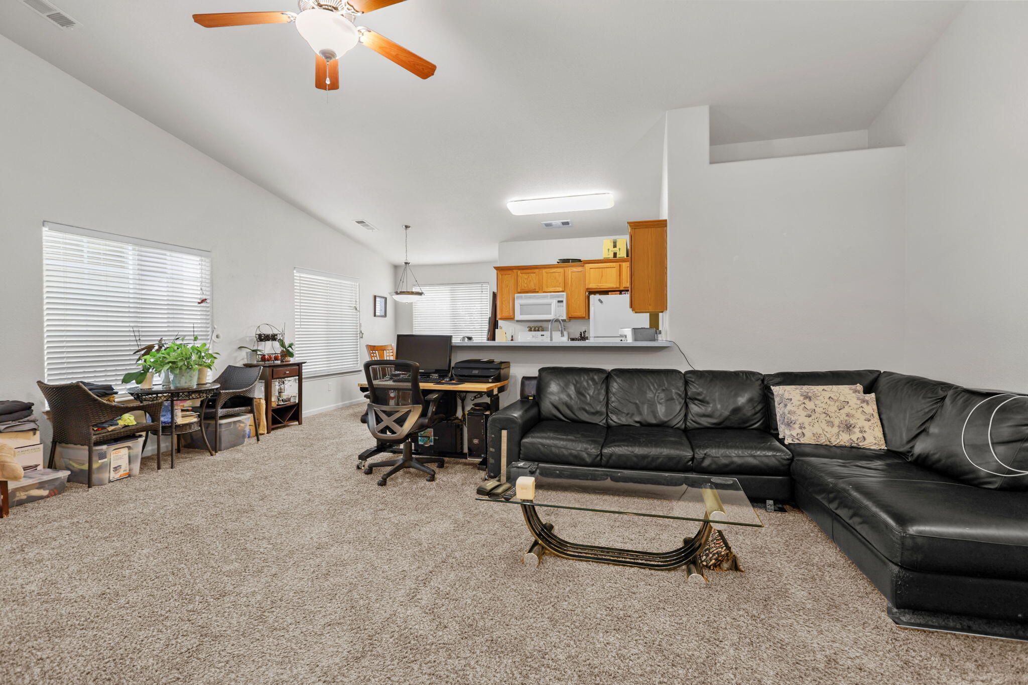 732 Stonebriar Trail Redding, CA 96003 - Photo 4 of 18 a living room with furniture and a piano