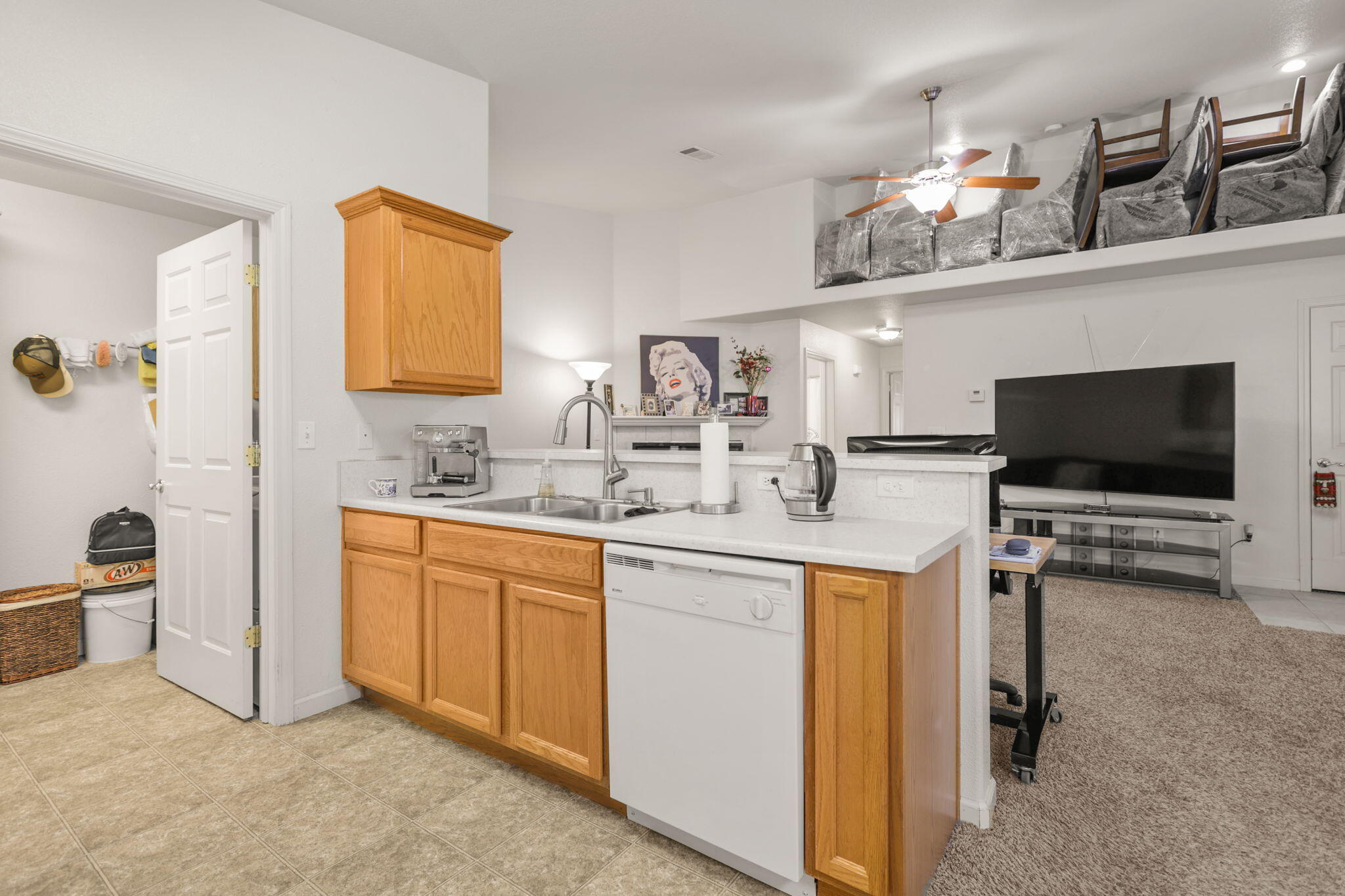 732 Stonebriar Trail Redding, CA 96003 - Photo 8 of 18 a kitchen with stainless steel appliances a sink and a refrigerator