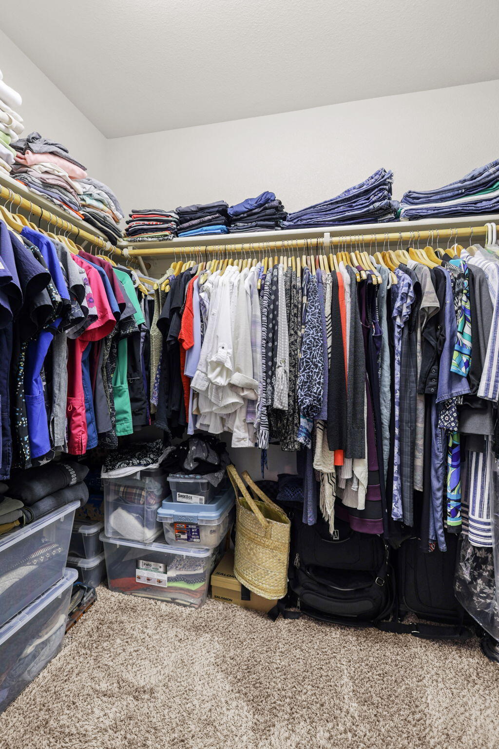 732 Stonebriar Trail Redding, CA 96003 - Photo 10 of 18 a view of walk in closet with clothes and shoes
