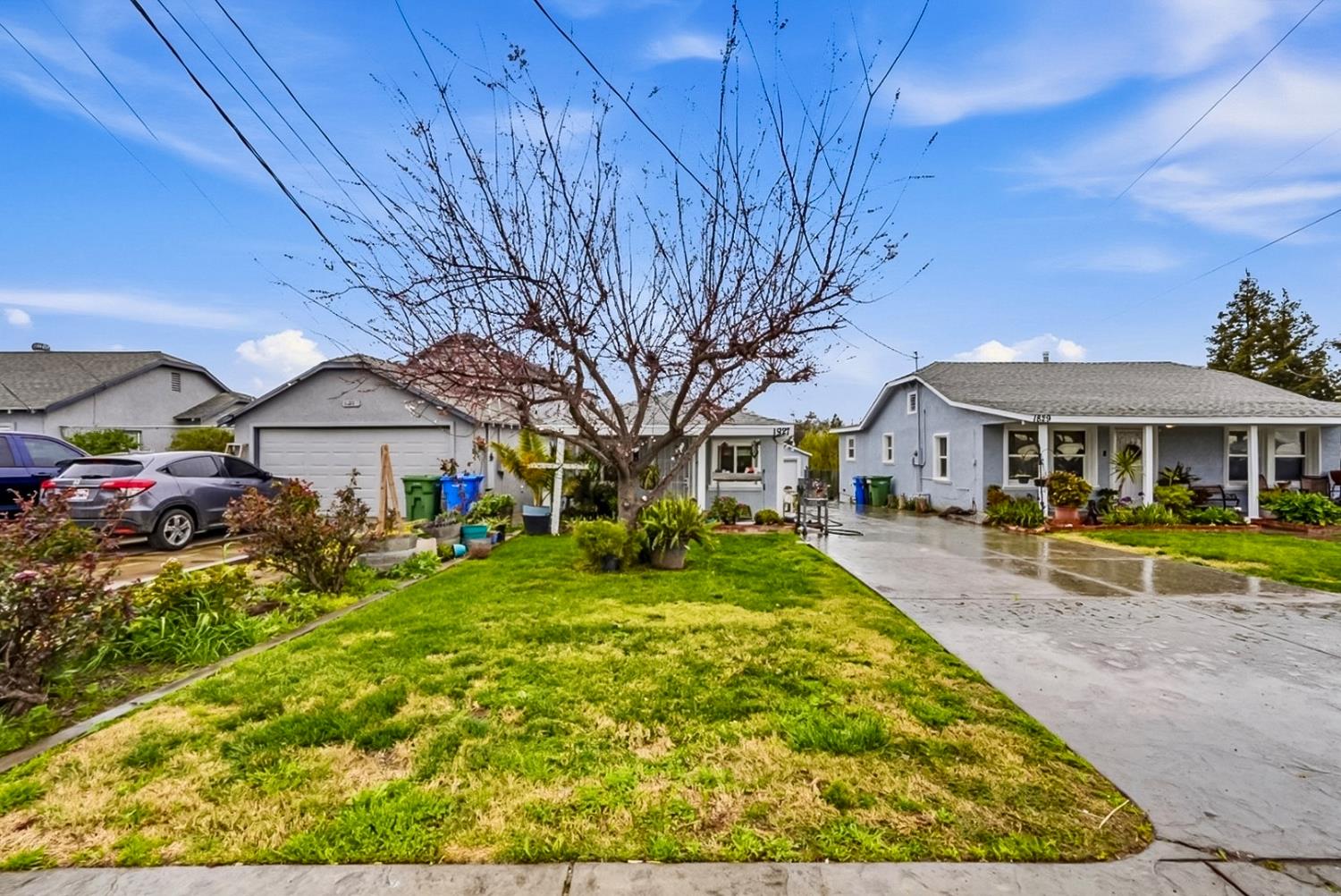 1829 River Road Modesto, CA 95351 - Photo 18 of 44 a front view of house with yard and green space