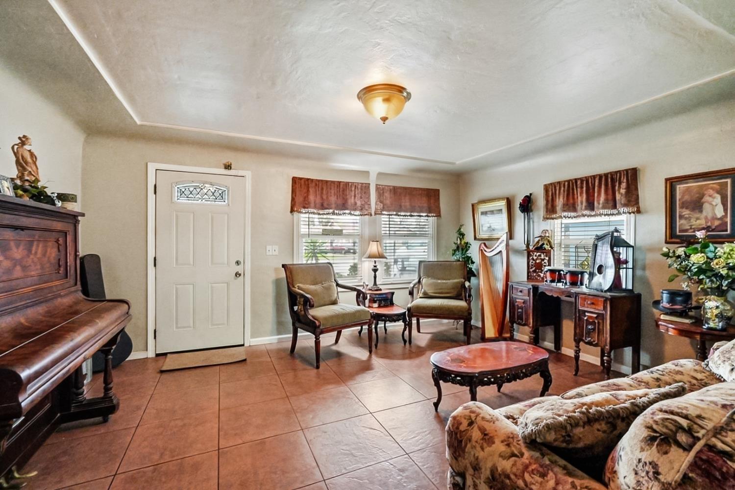 1829 River Road Modesto, CA 95351 - Photo 44 of 44 a bedroom with furniture and a window