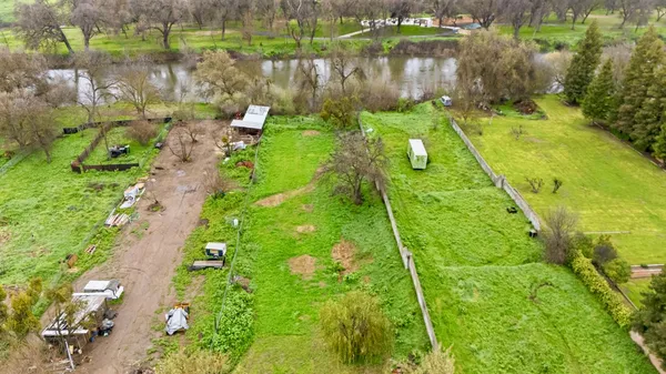 a garden view with a lake view