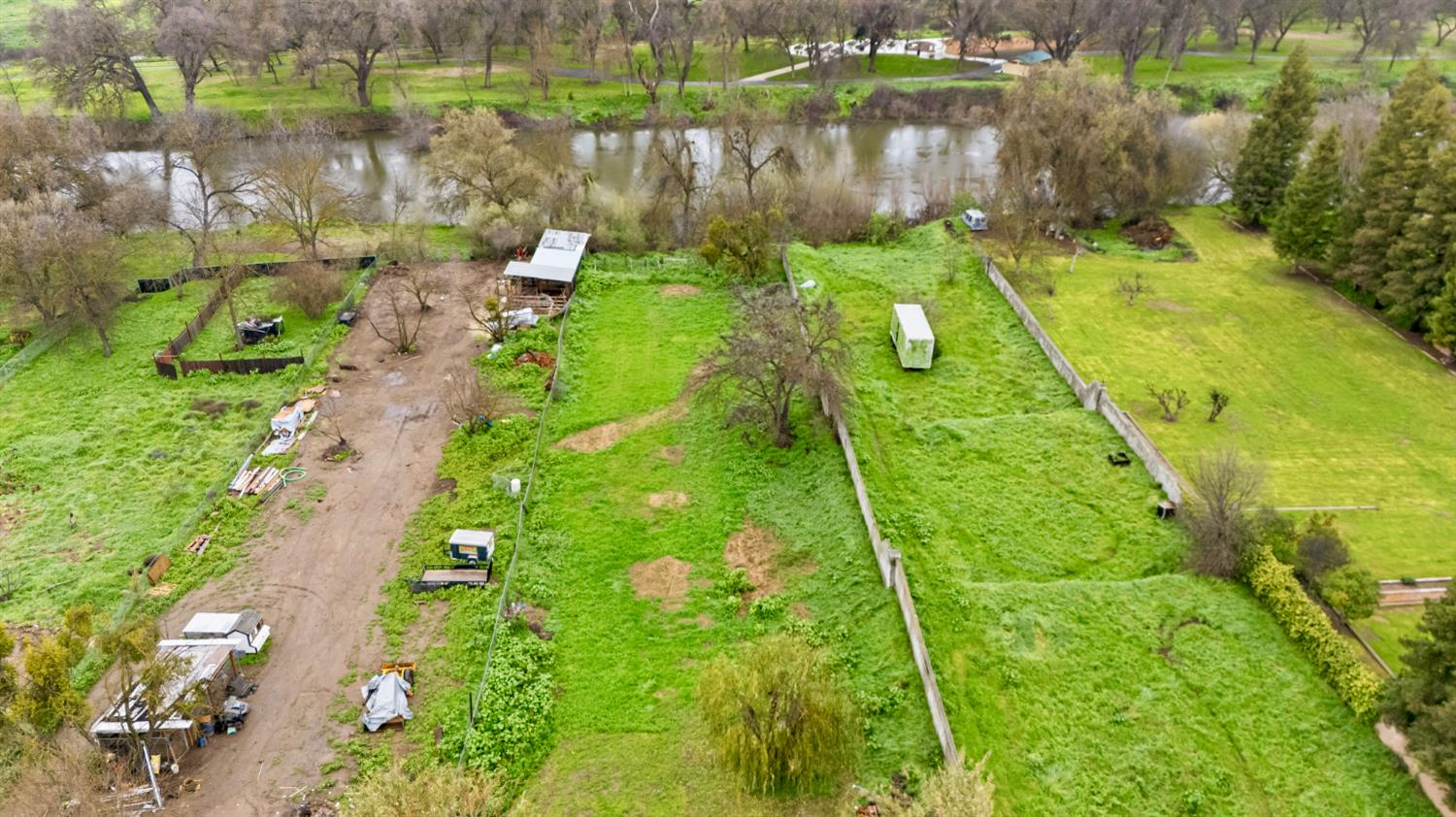 1829 River Road Modesto, CA 95351 - Photo 5 of 44 a garden view with a lake view