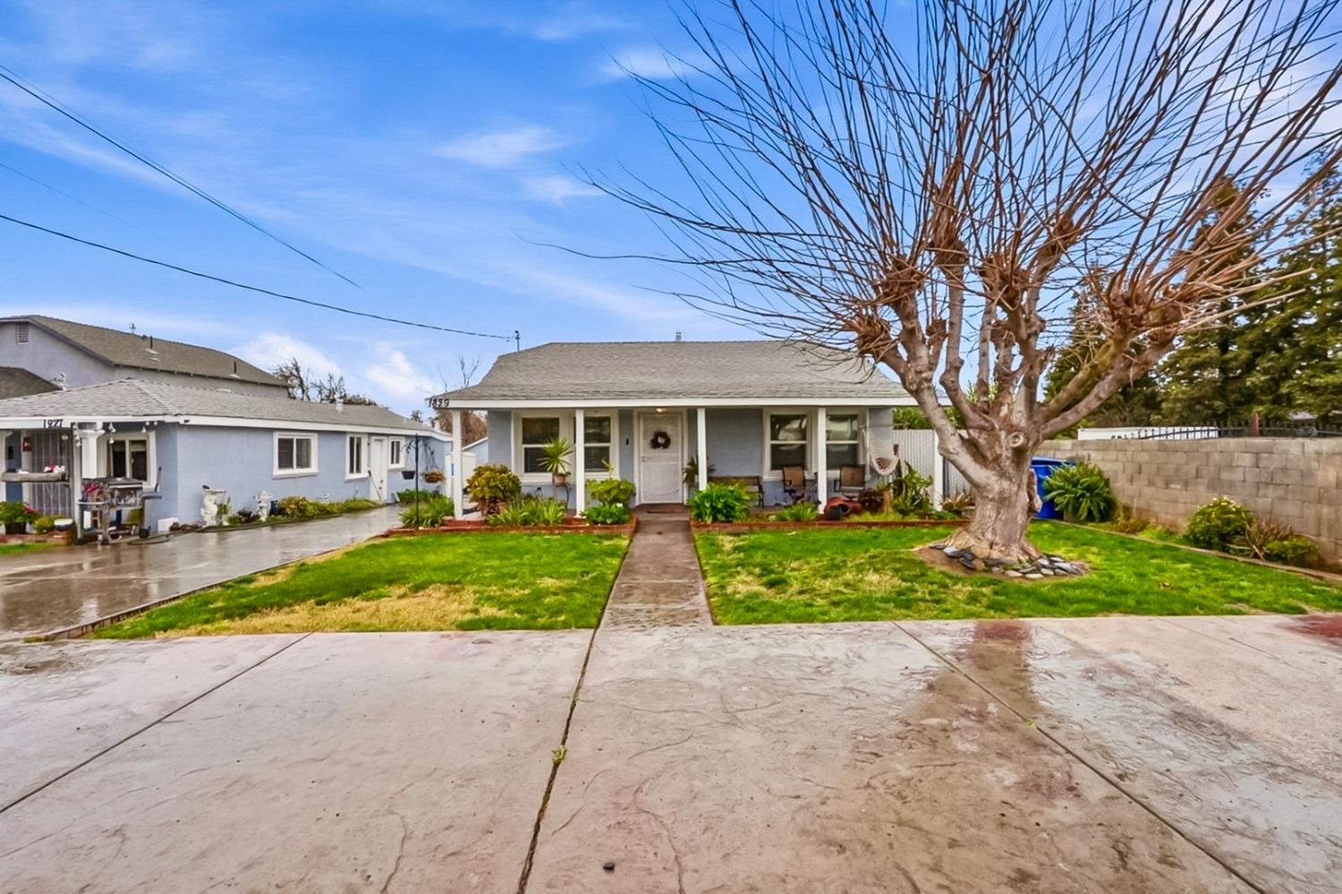 1829 River Road Modesto, CA 95351 - Photo 8 of 44 a front view of house with a garden