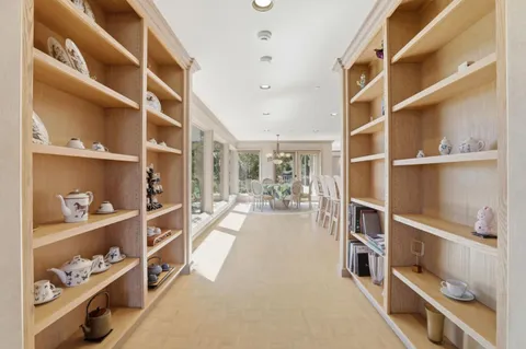a view of a room with shelves