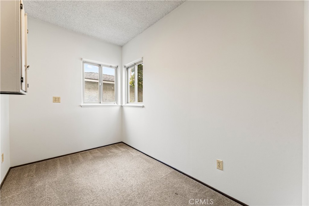 9063 Gotham Street Downey, CA 90241 - Photo 26 of 45 an empty room with windows