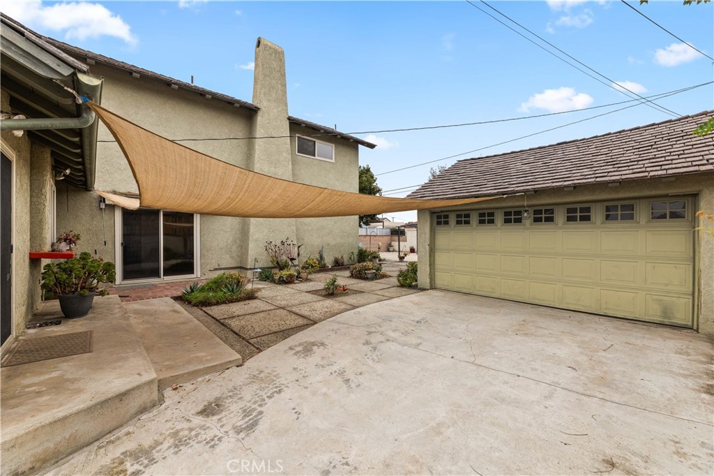 9063 Gotham Street Downey, CA 90241 - Photo 30 of 45 a view of a house with backyard
