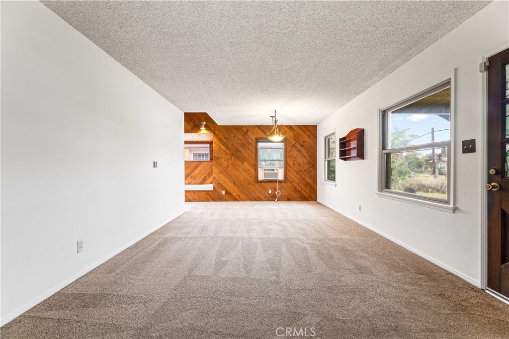 9063 Gotham Street Downey, CA 90241 - Photo 38 of 45 an empty room with windows