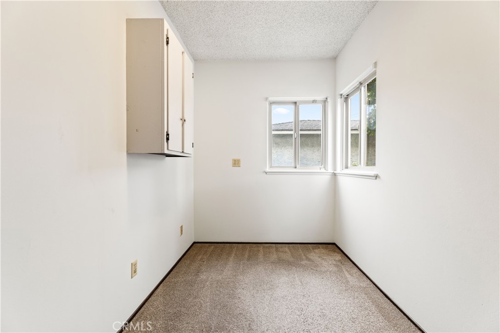 9063 Gotham Street Downey, CA 90241 - Photo 41 of 45 an empty room with windows