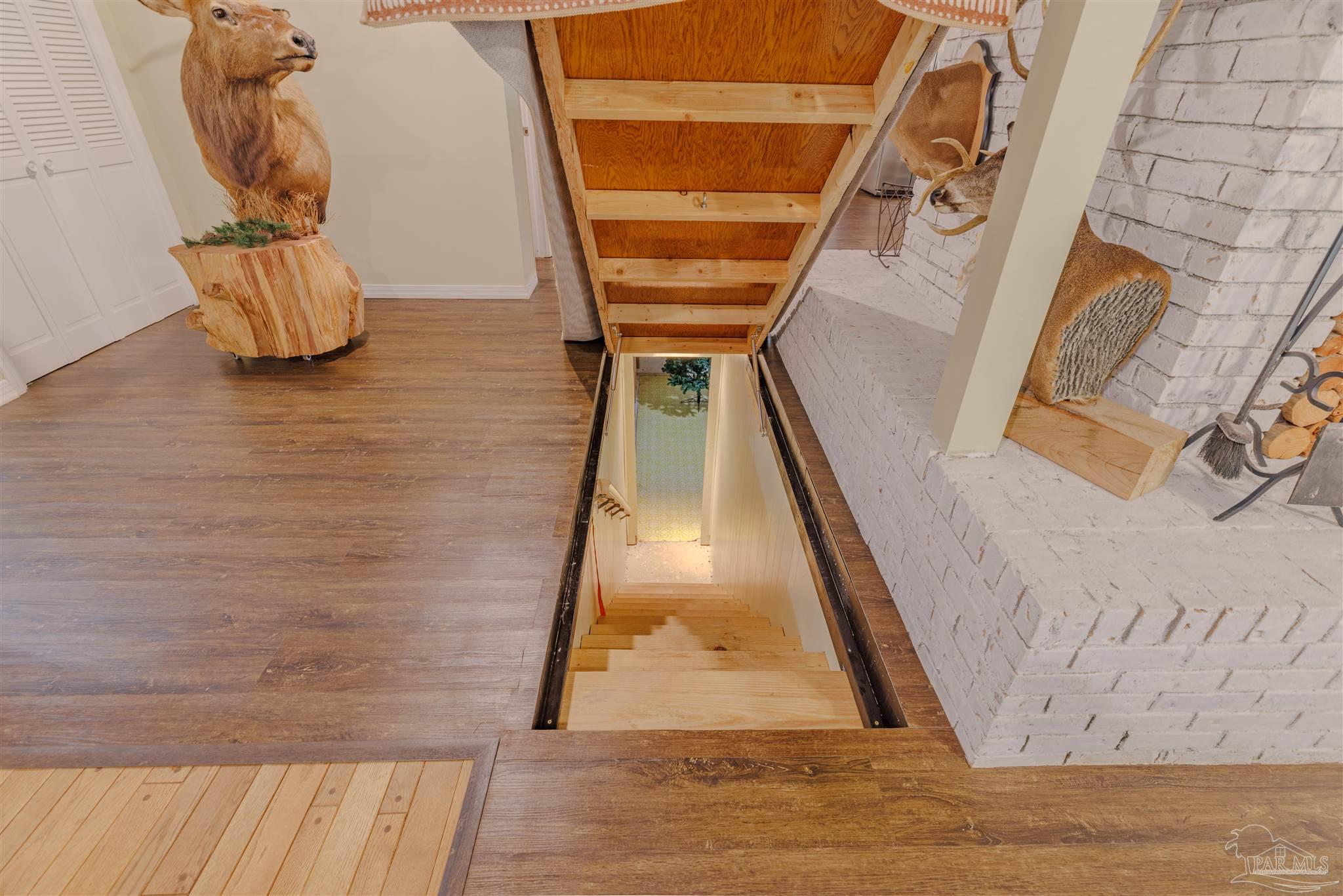 5049 Guernsey Road Pace, FL 32571 - Photo 43 of 61 a view of entryway with wooden floor