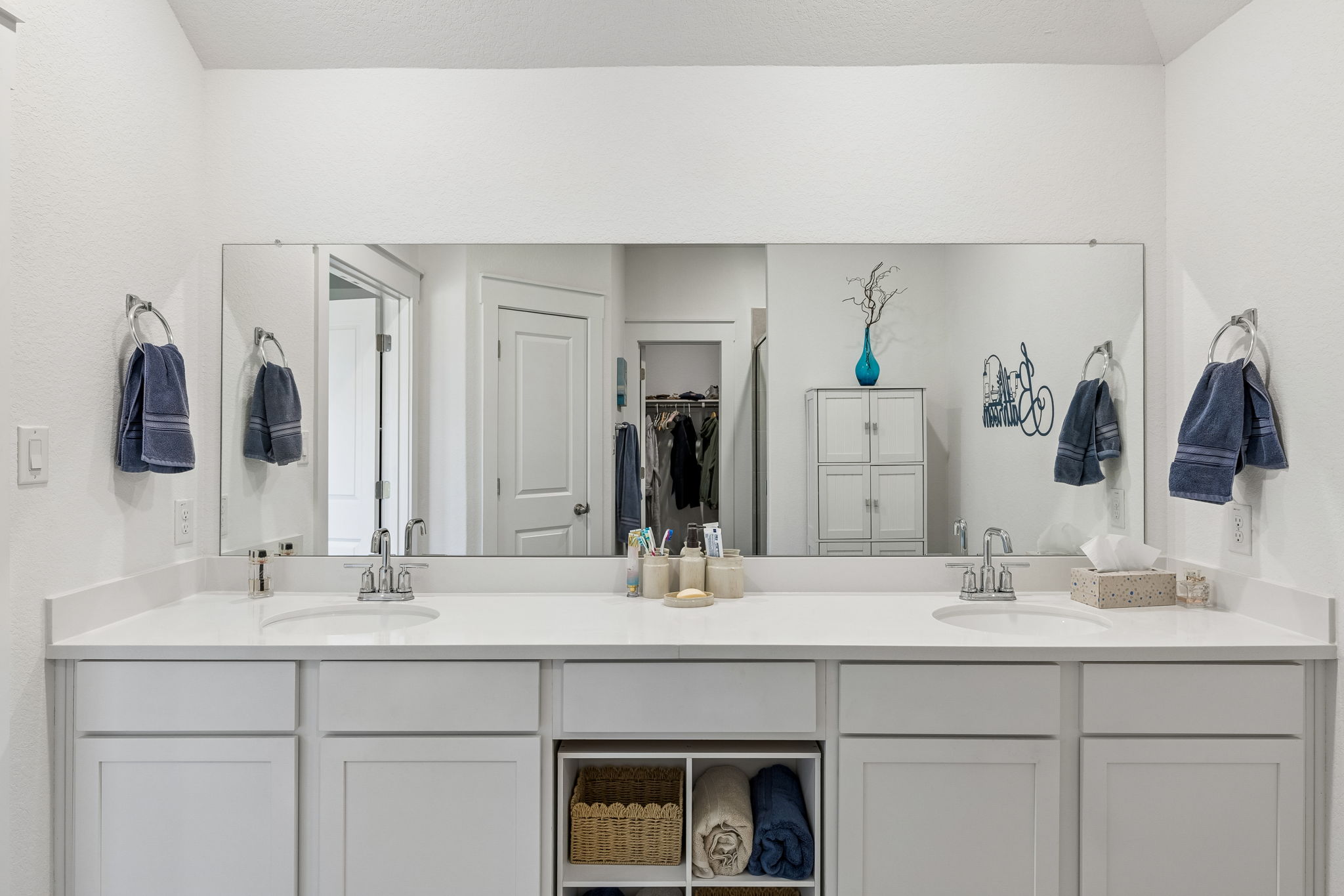 13509 Barn Chime Street Elgin, TX 78621 - Photo 23 of 40 Double vanity featuring storage space and comfort height counters.