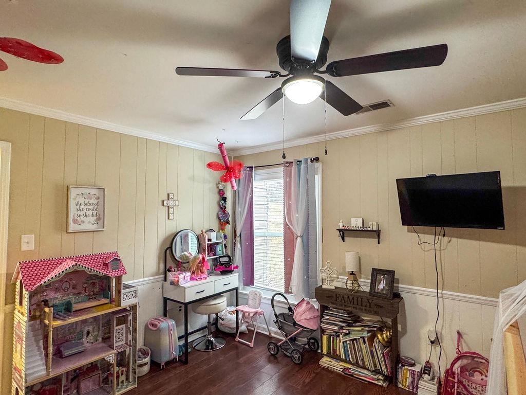 127 Walton Loop Covington, TN 38019 - Photo 26 of 40 a living room with furniture and a flat screen tv