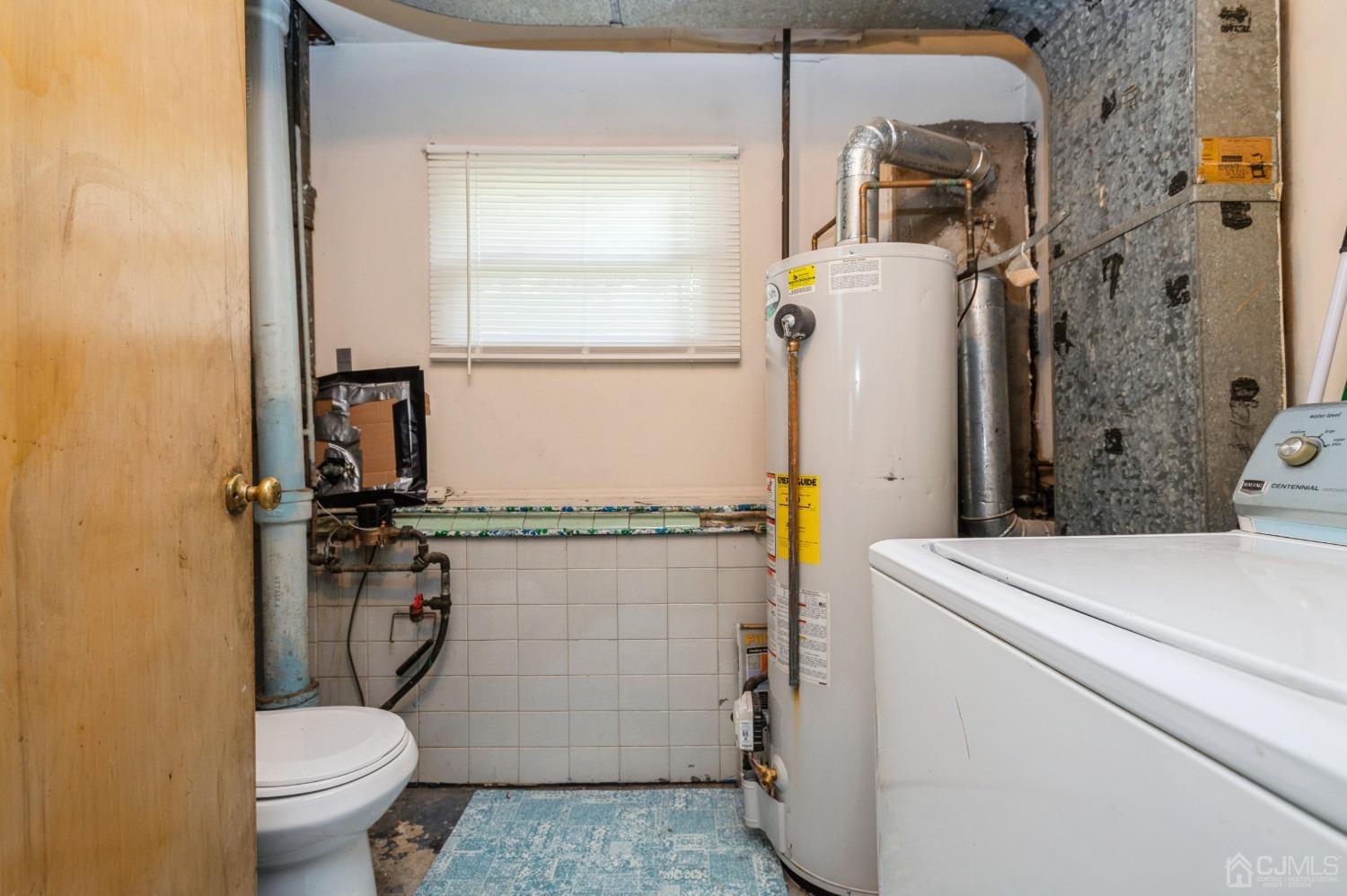2 Leland Road Edison, NJ 08817 - Photo 17 of 25 a bathroom with a toilet and a shower