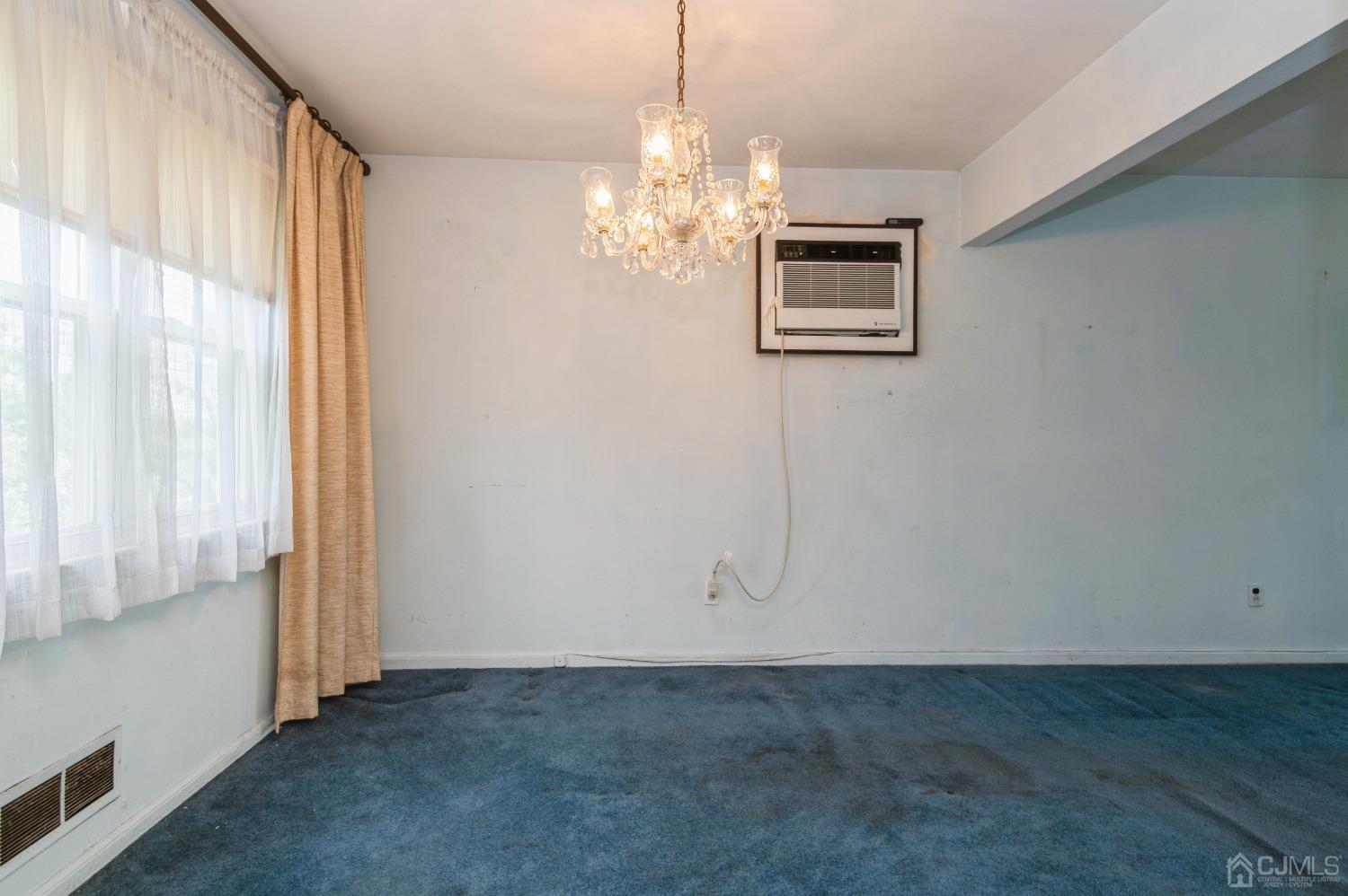 2 Leland Road Edison, NJ 08817 - Photo 7 of 25 a view of a chandelier fan and windows