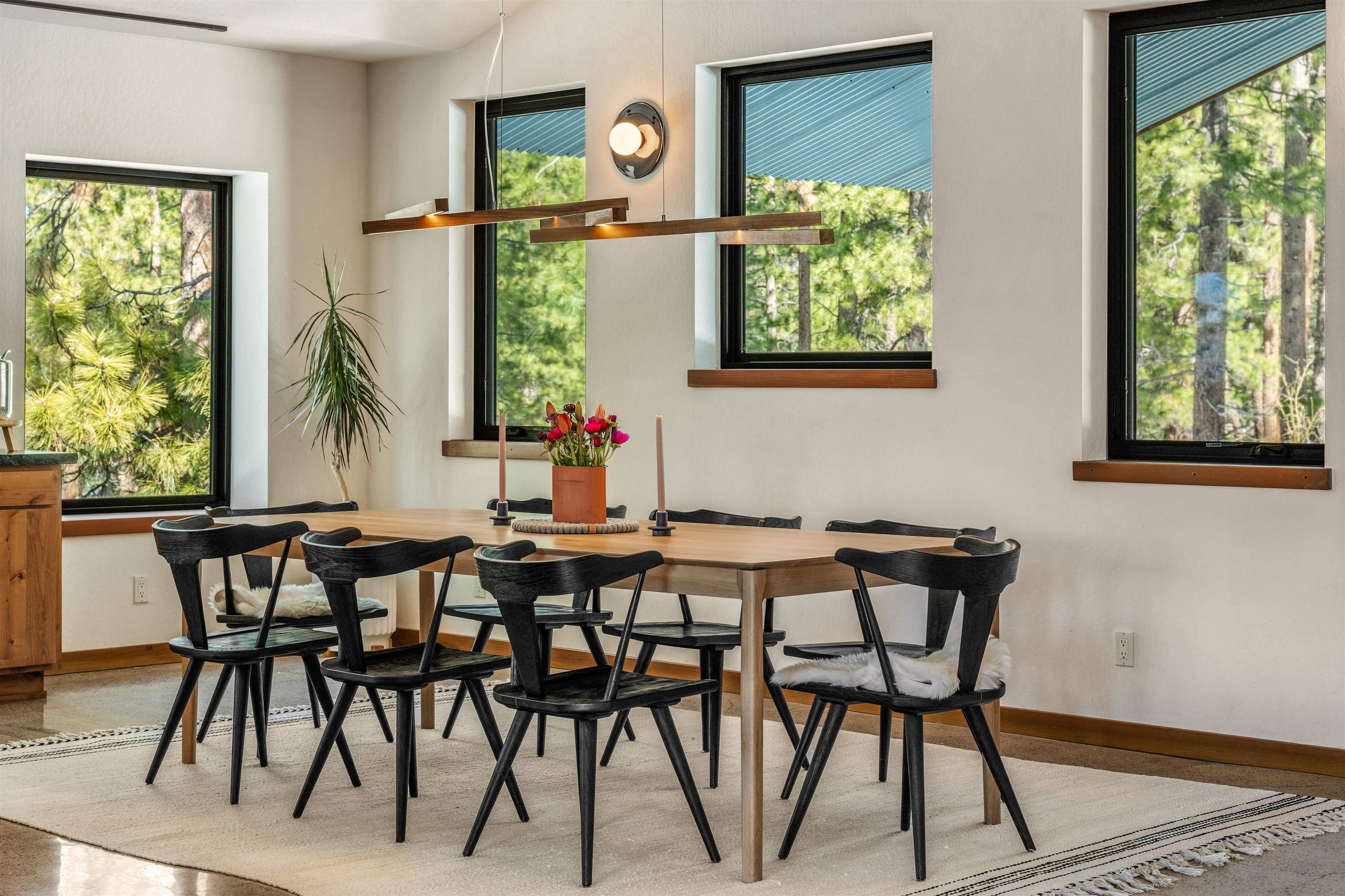 14802 Foxboro Drive Truckee, CA 96161 - Photo 11 of 21 a view of a dining room with furniture window and outside view