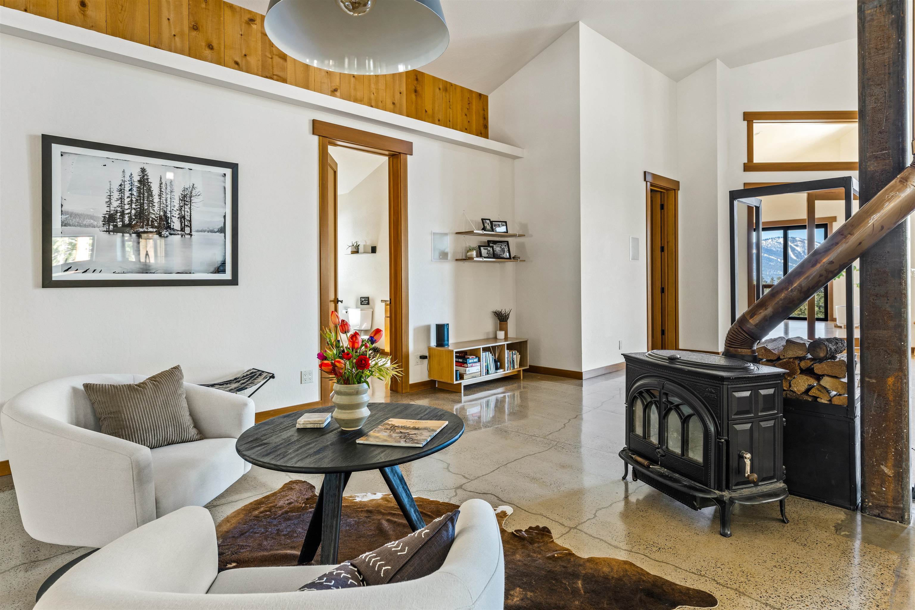 14802 Foxboro Drive Truckee, CA 96161 - Photo 12 of 21 a living room with furniture a rug and a window