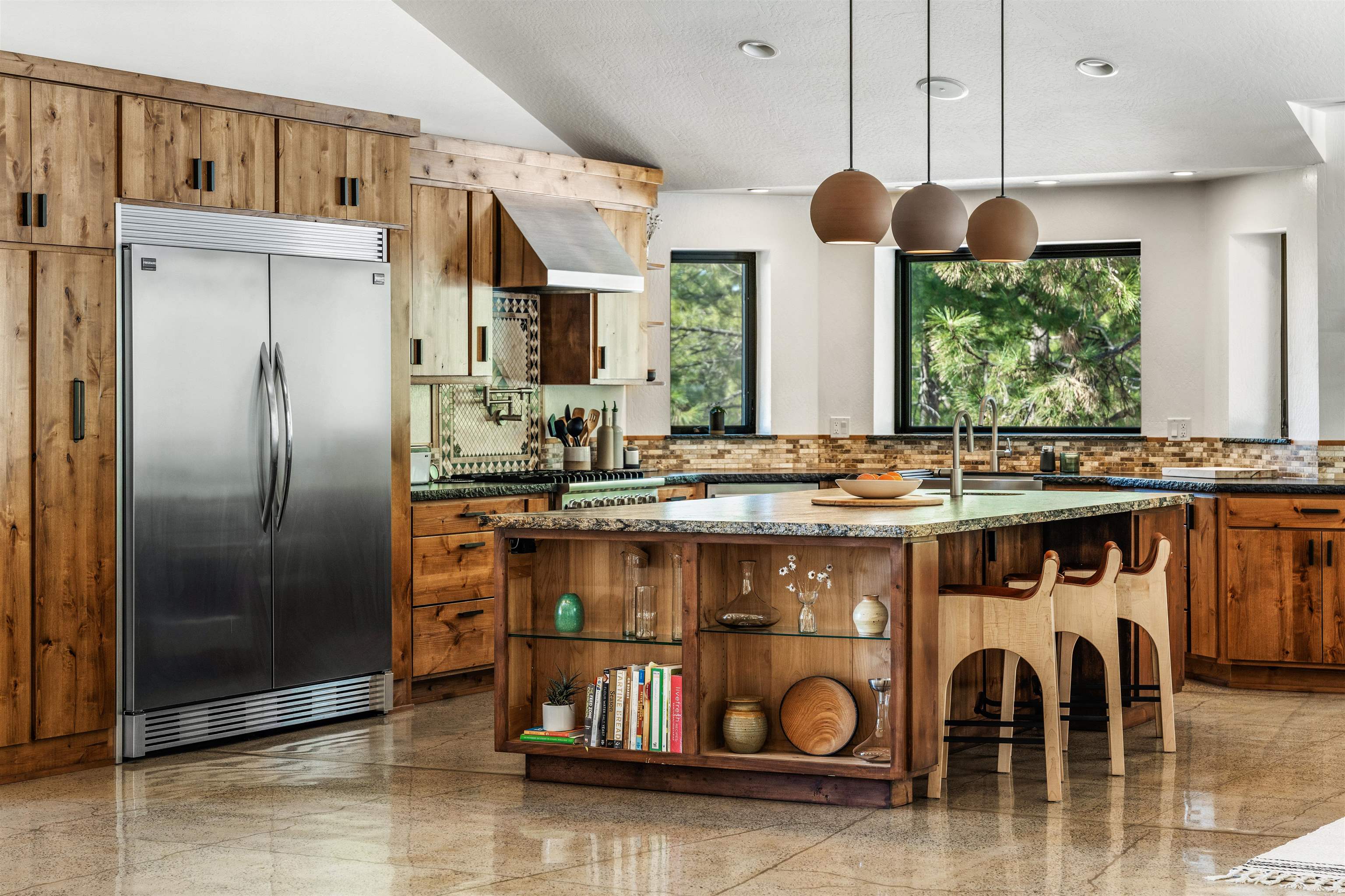 14802 Foxboro Drive Truckee, CA 96161 - Photo 9 of 21 a kitchen with stainless steel appliances granite countertop a sink and a refrigerator