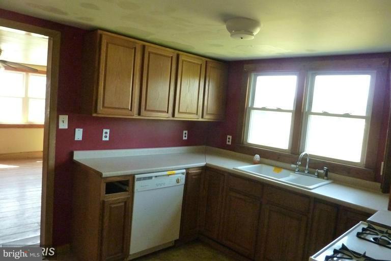 2248 Elliott Island Road Vienna, MD 21869 - Photo 10 of 10 a kitchen with a sink and a window
