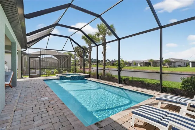 a view of a swimming pool with a porch
