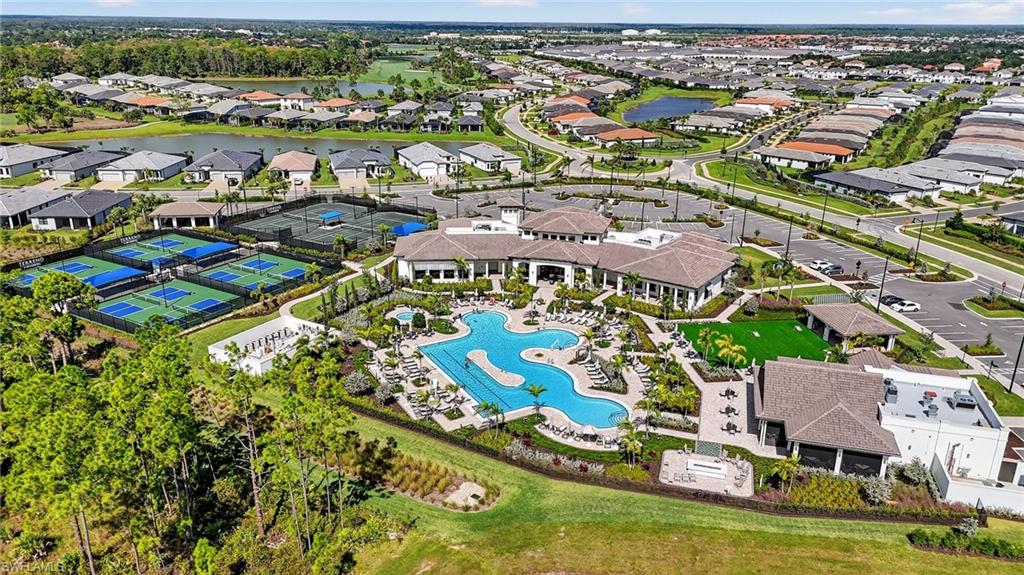 1953 Fresno Avenue Naples, FL 34120 - Photo 27 of 33 an aerial view of residential houses with outdoor space
