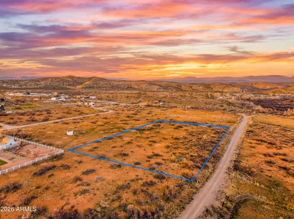 a view of a city with an ocean