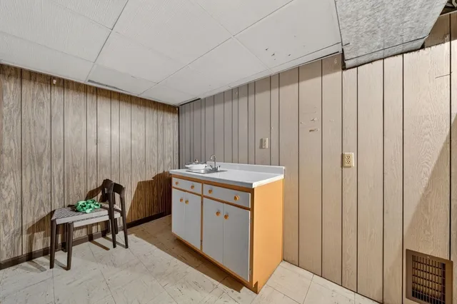 a room with a chair and a table