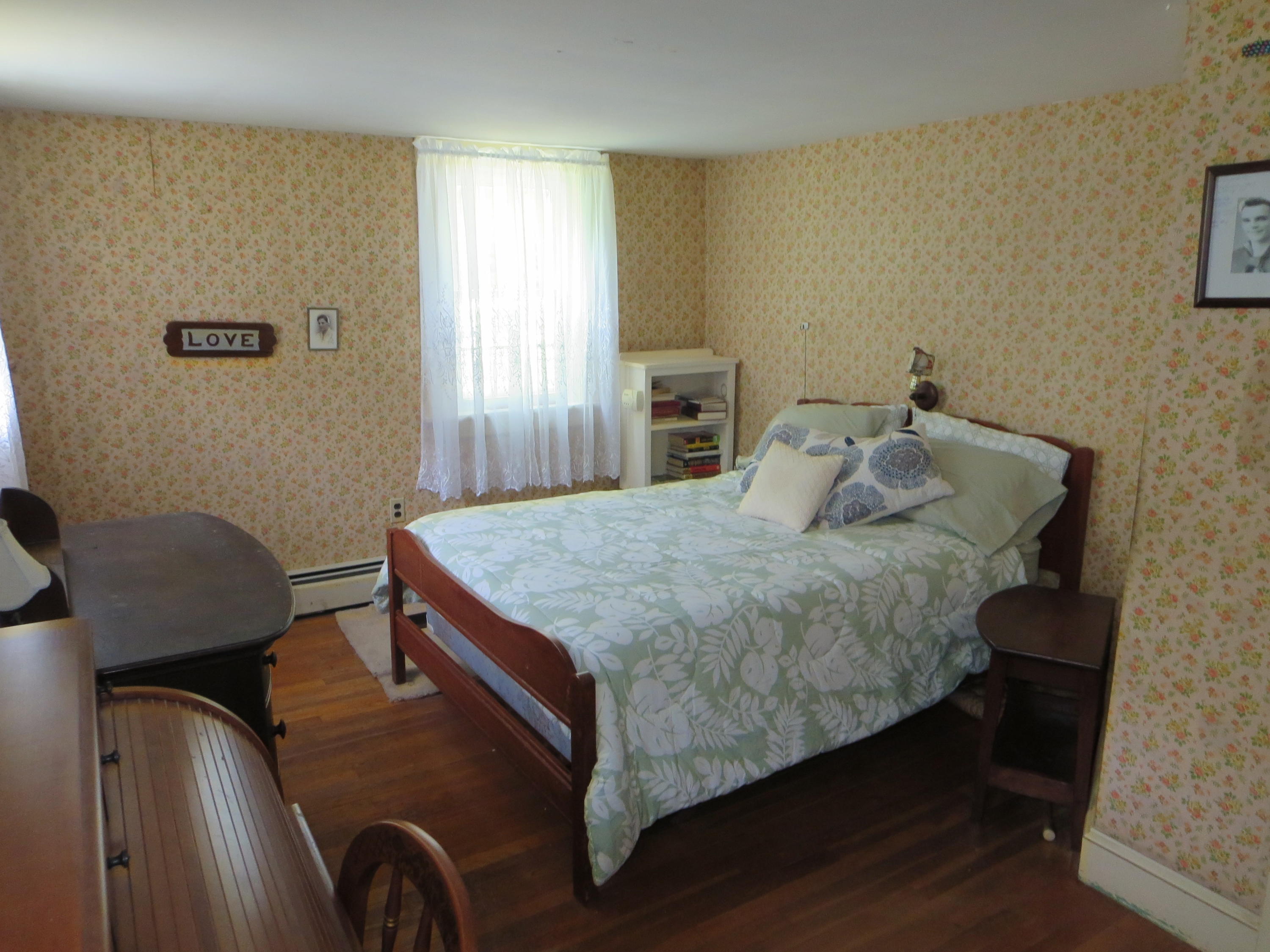 29 Kelley Road Hyannis, MA 02601 - Photo 14 of 21 a bedroom with a bed window and chair