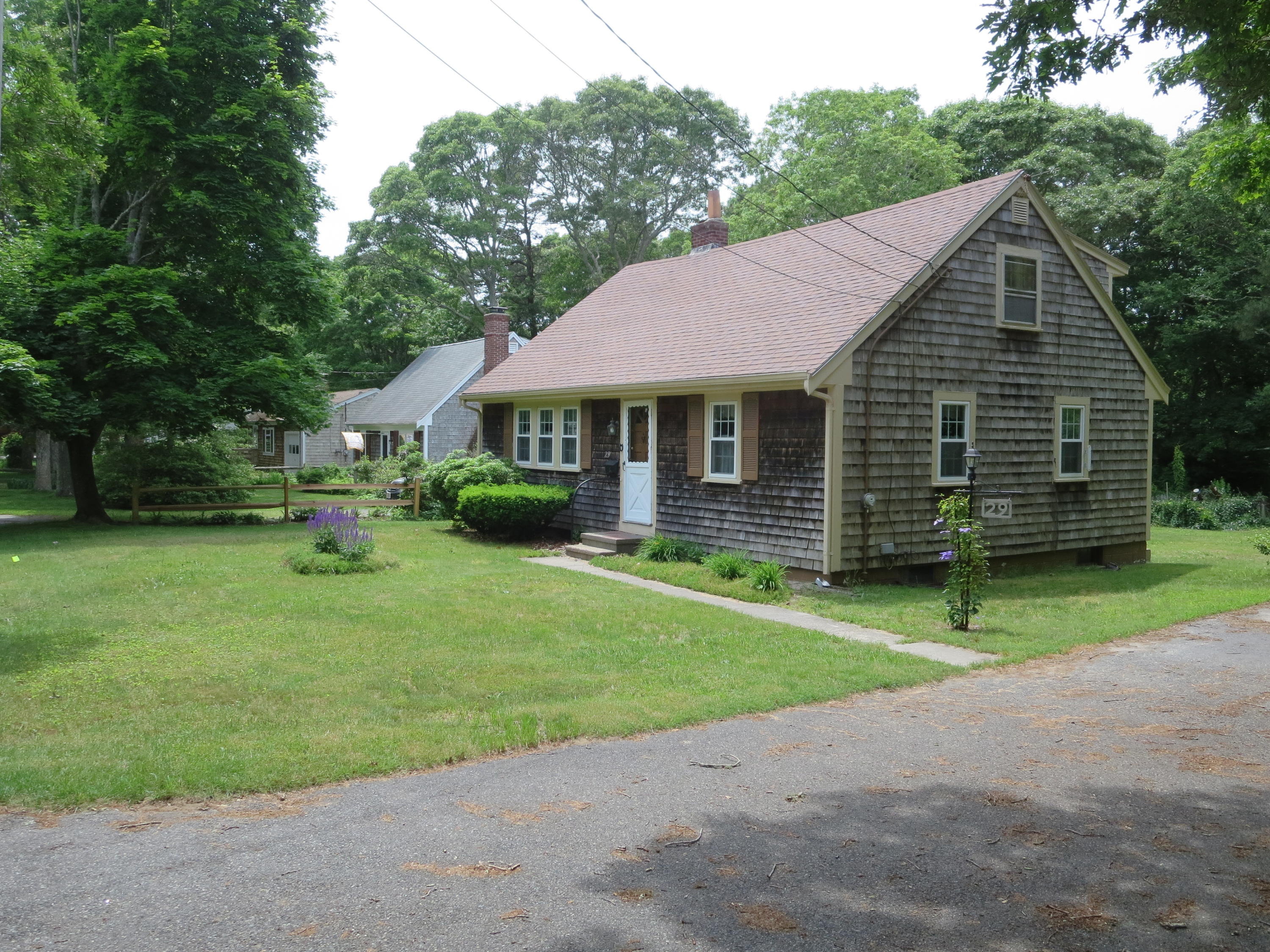 29 Kelley Road Hyannis, MA 02601 - Photo 3 of 21 a house with a garden view