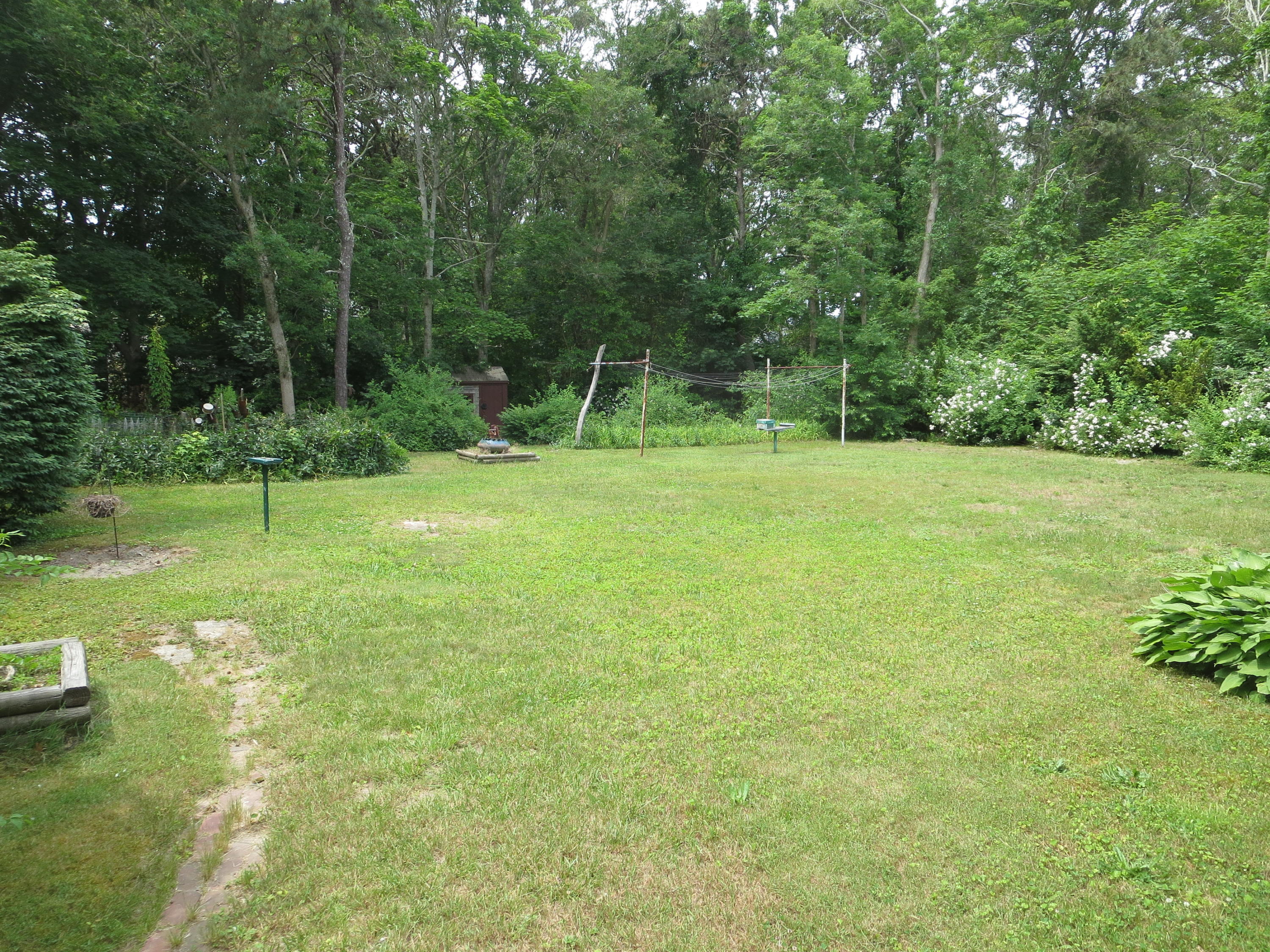 29 Kelley Road Hyannis, MA 02601 - Photo 4 of 21 a view of a field with a tree