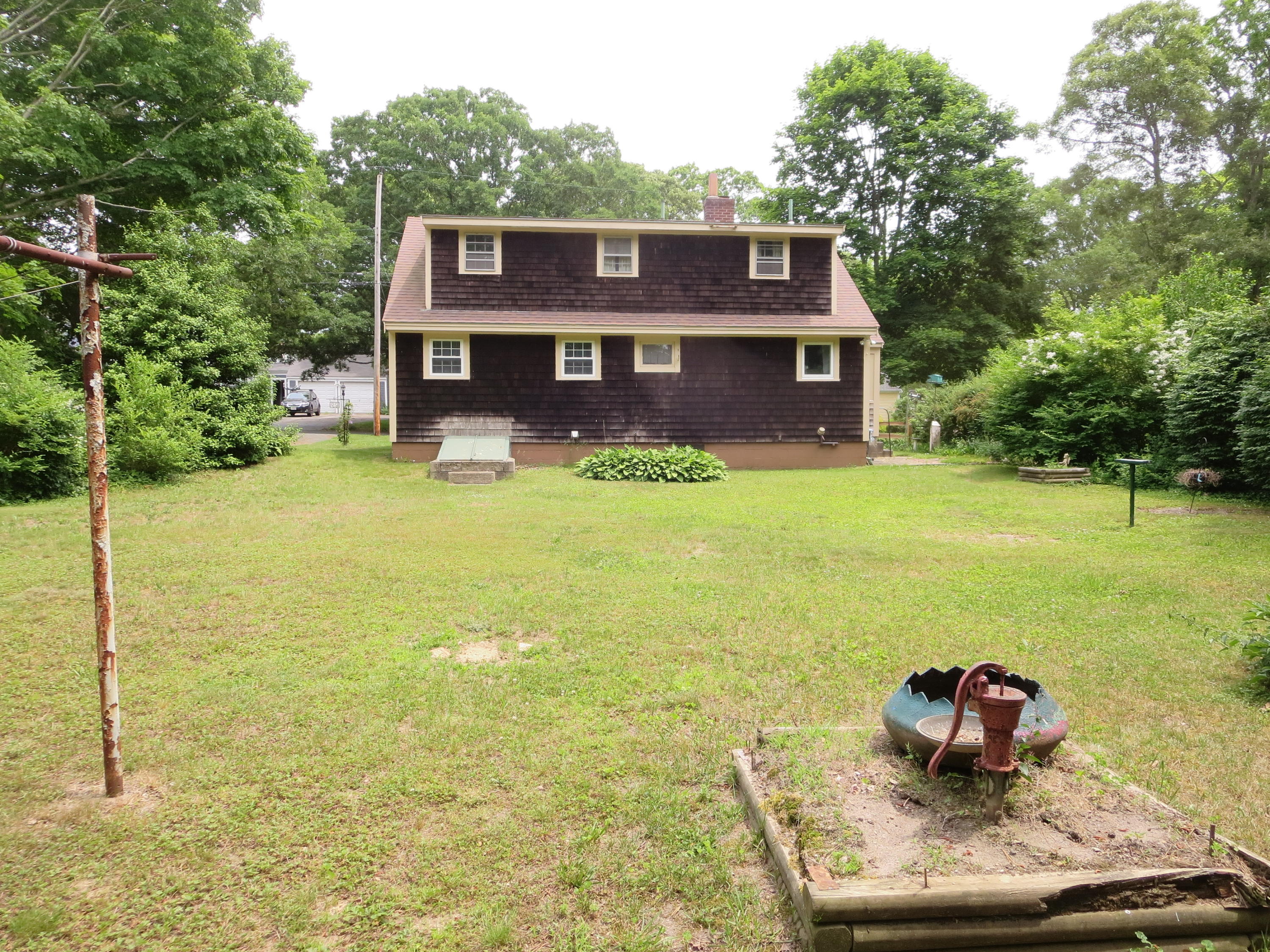 29 Kelley Road Hyannis, MA 02601 - Photo 6 of 21 a front view of a house with a yard