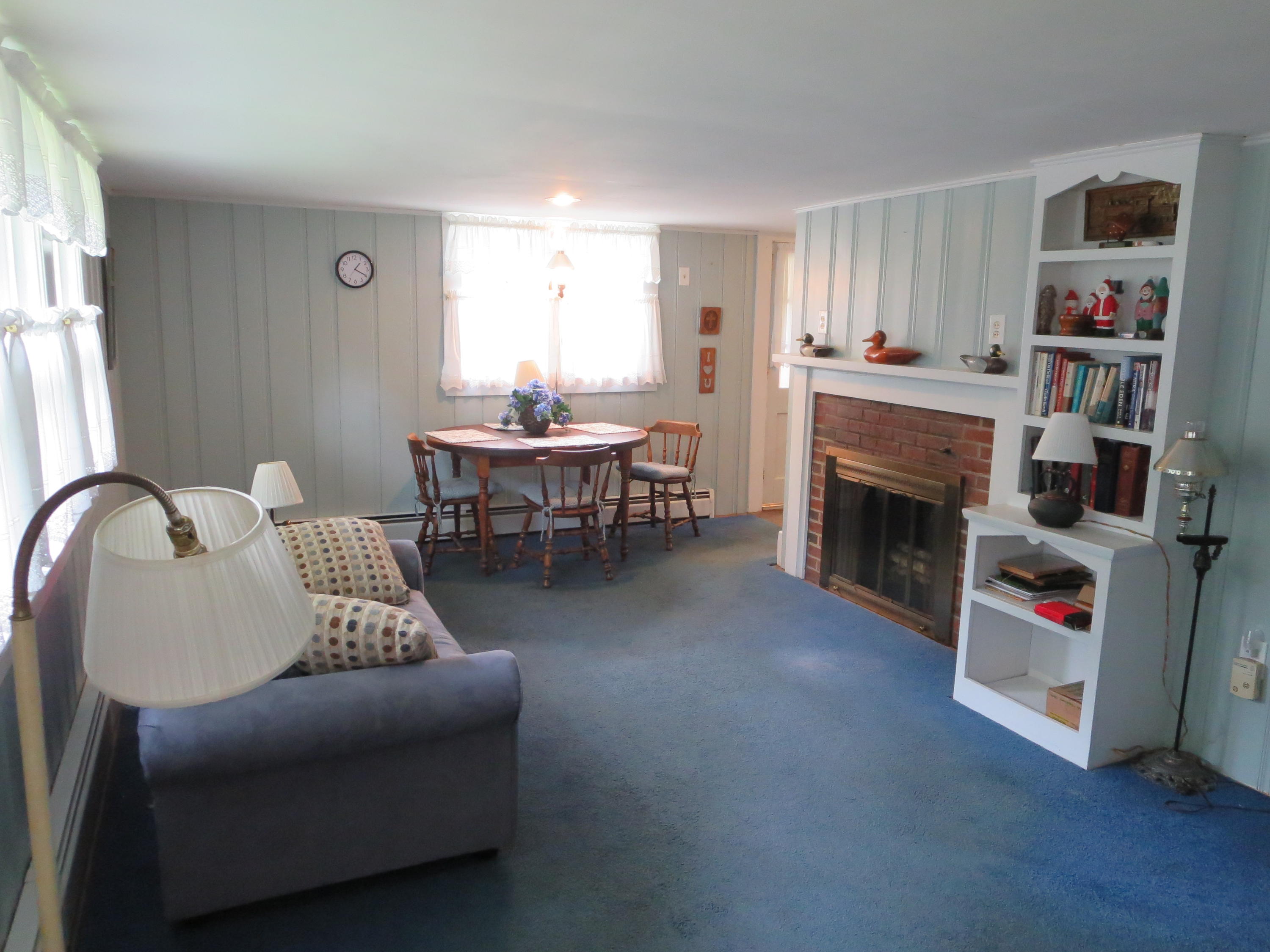 29 Kelley Road Hyannis, MA 02601 - Photo 9 of 21 a living room with furniture and a fireplace