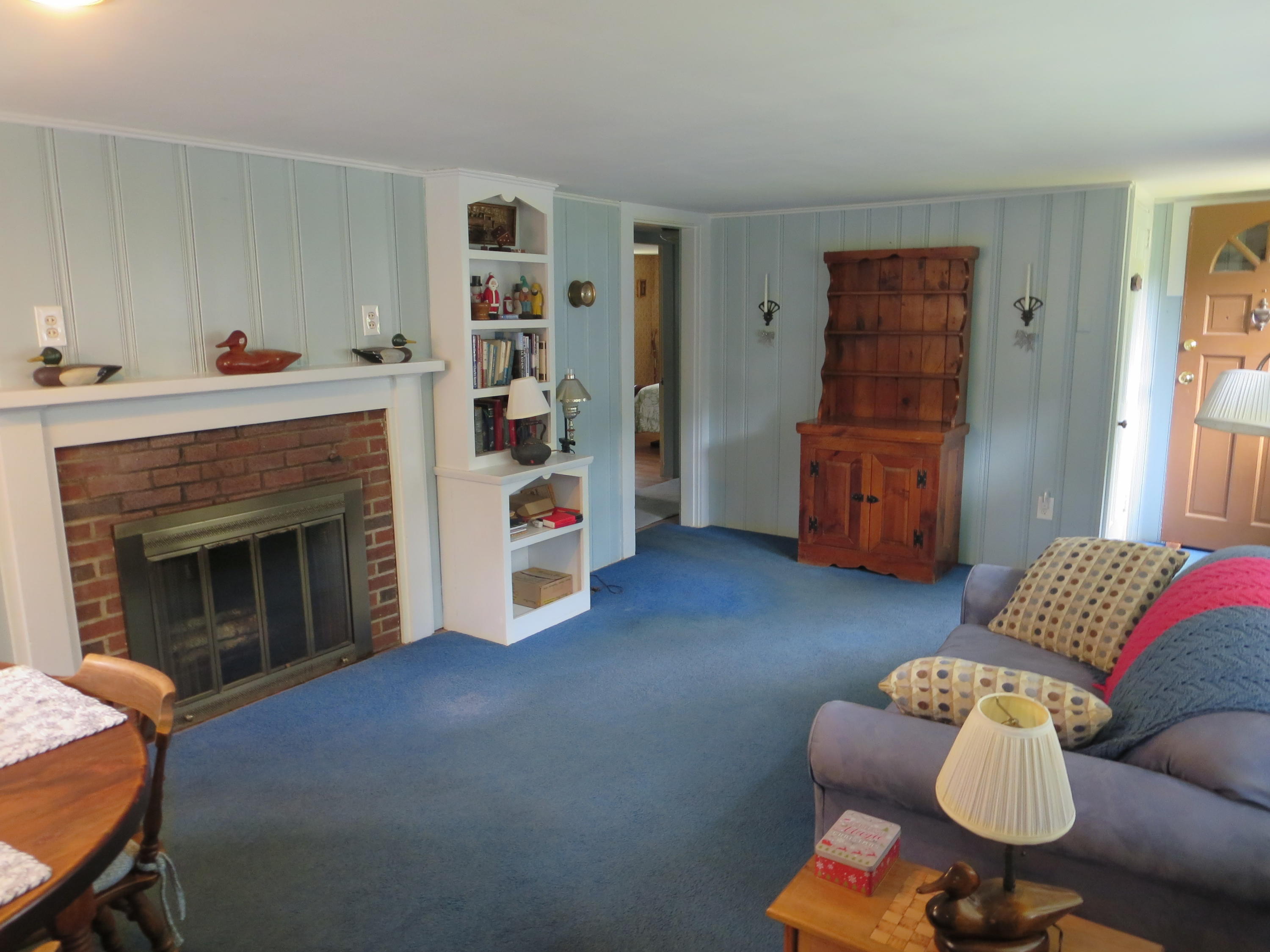 29 Kelley Road Hyannis, MA 02601 - Photo 10 of 21 a living room with furniture and a fireplace