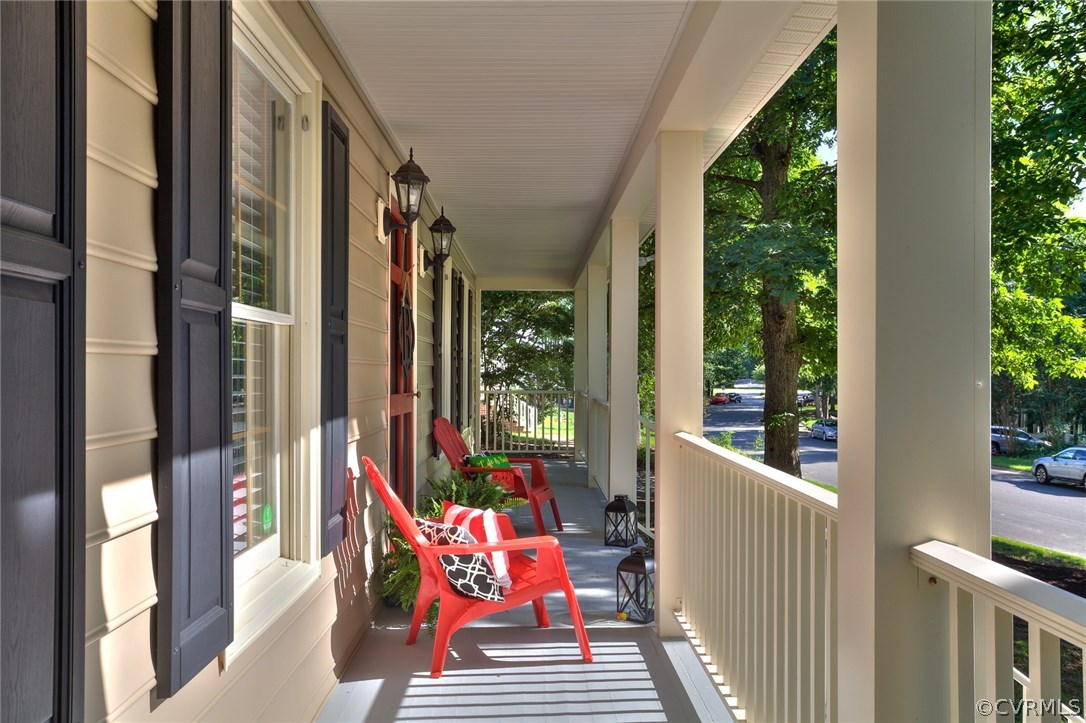 Relax on the cool porch overlooking the quiet stre