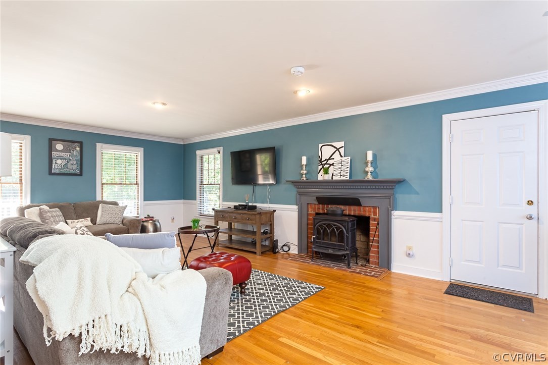 Spacious family room with gorgeous fireplace and m
