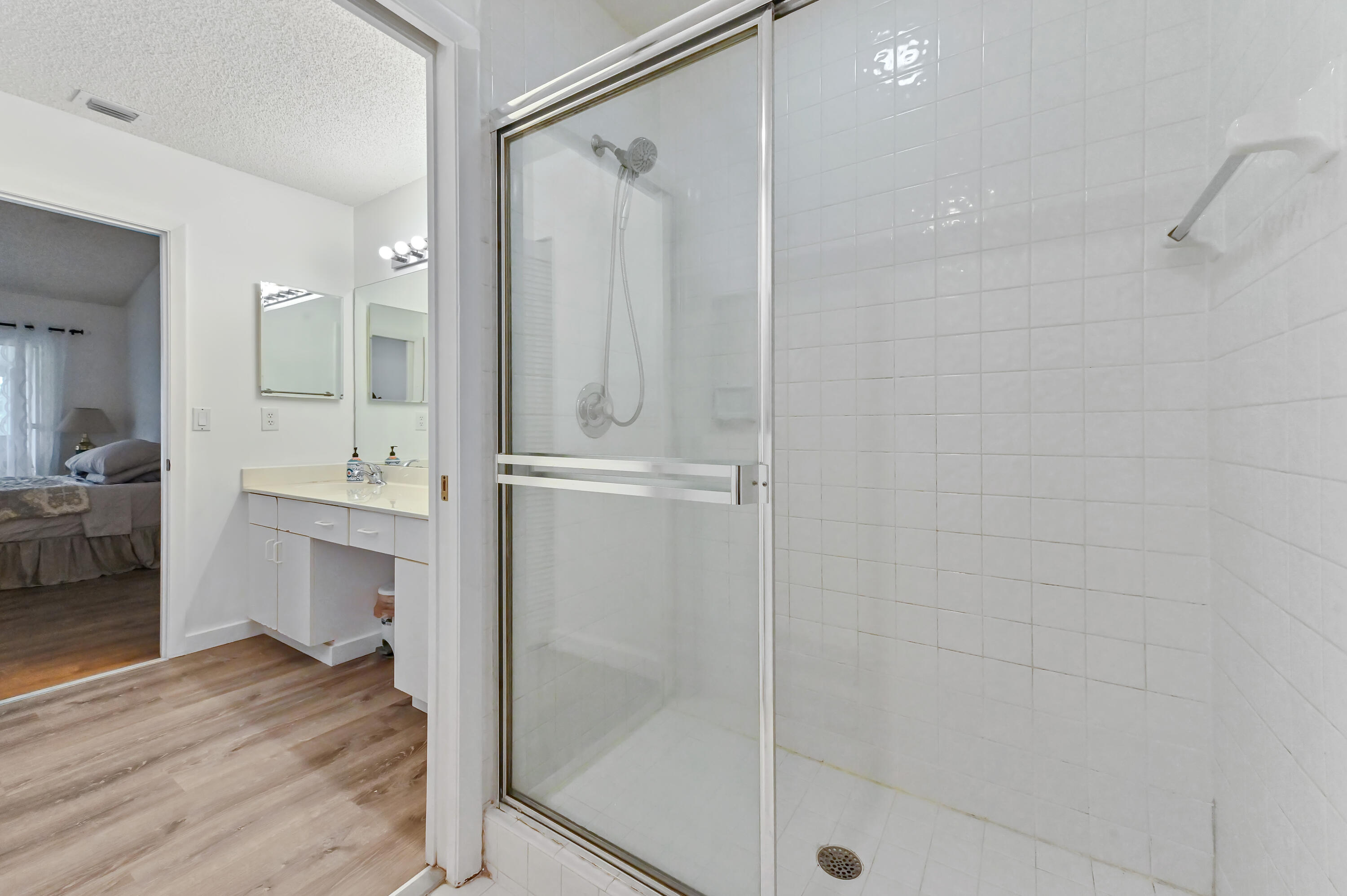7433 Shell Ridge Terrace Lake Worth, FL 33467 - Photo 23 of 45 a bathroom with a shower and a sink